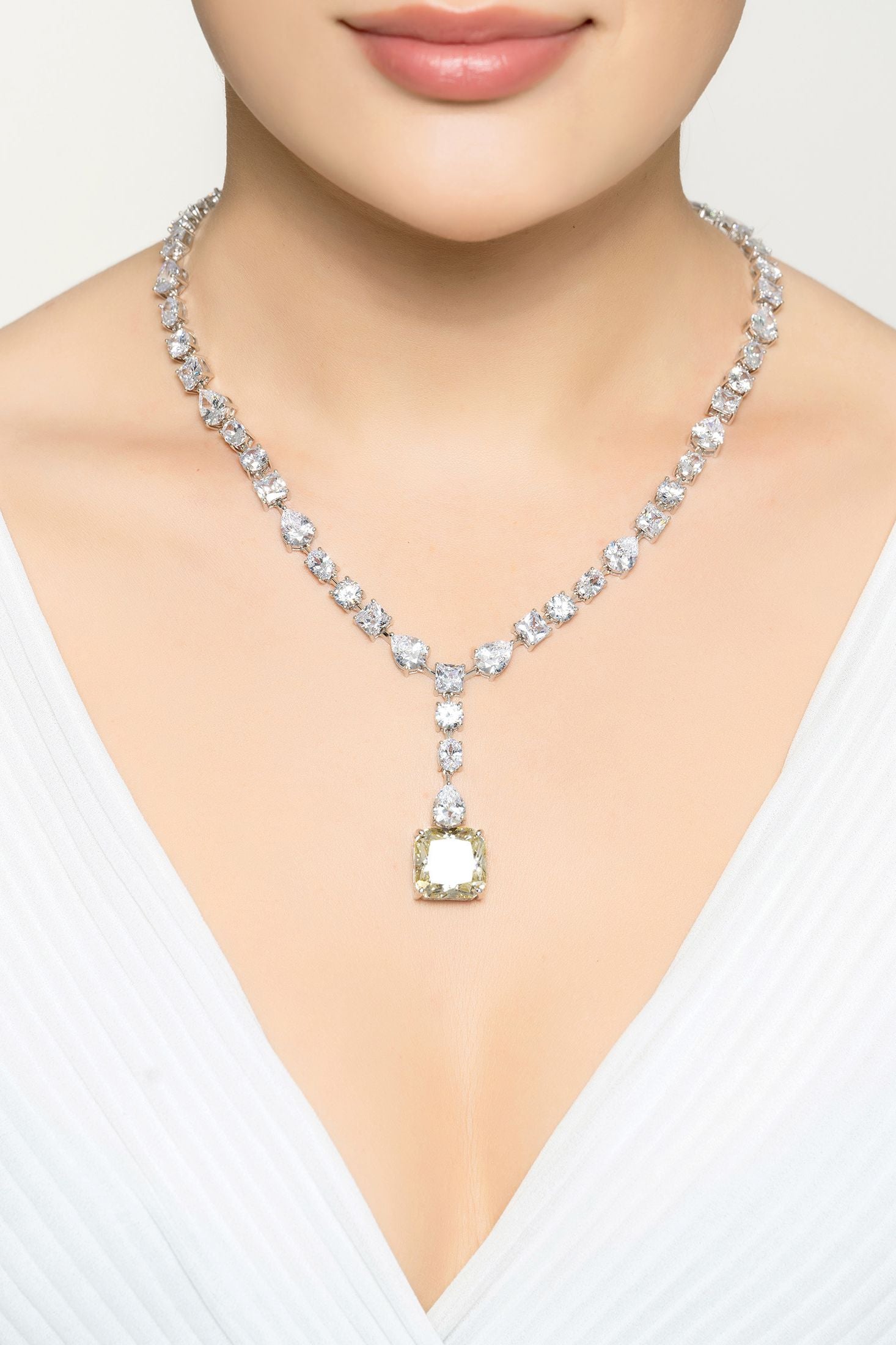 The necklace worn by a model.