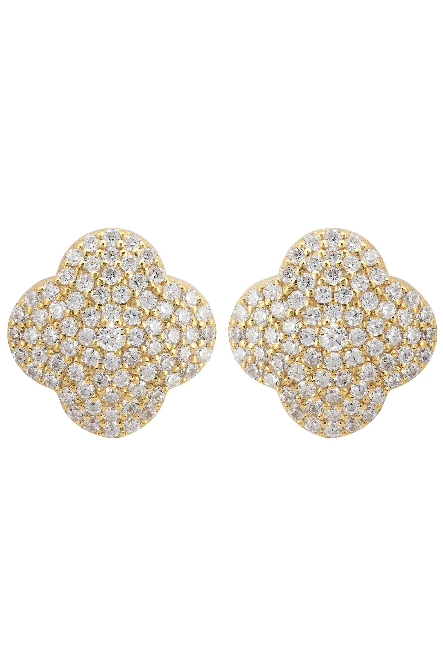 Diamond and gold clover stud earrings.