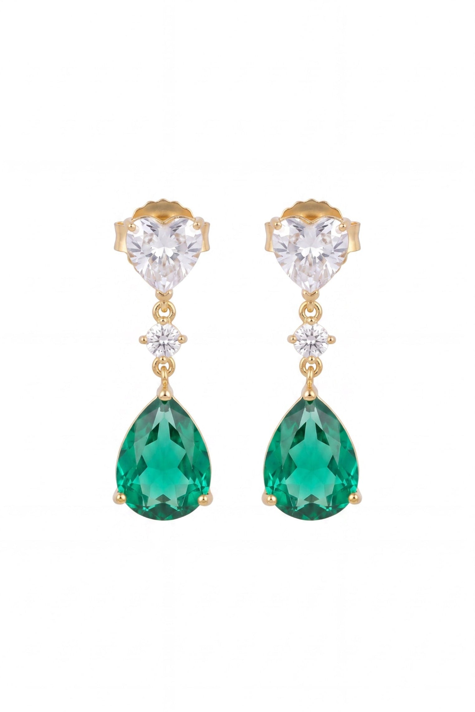 A pair of gold drop earrings featuring a heart-shaped clear crystal, a small clear star-shaped crystal, and a faceted green teardrop gemstone, shown against a plain white background.