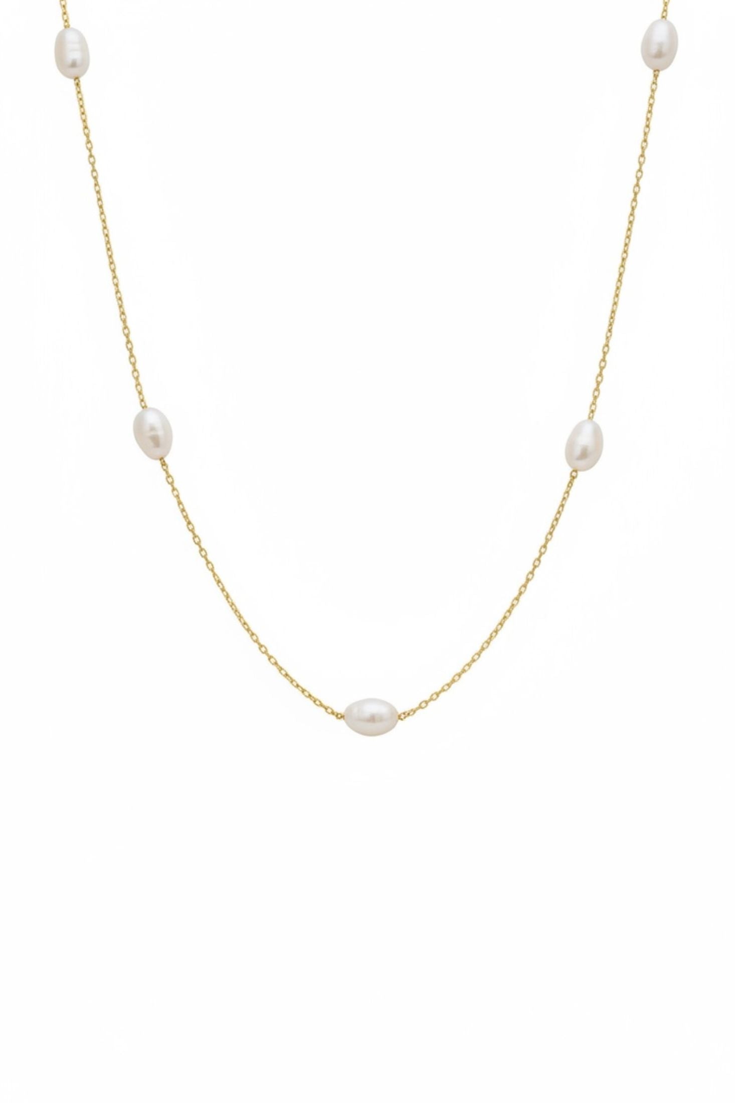 Gold necklace with pearls on a white background