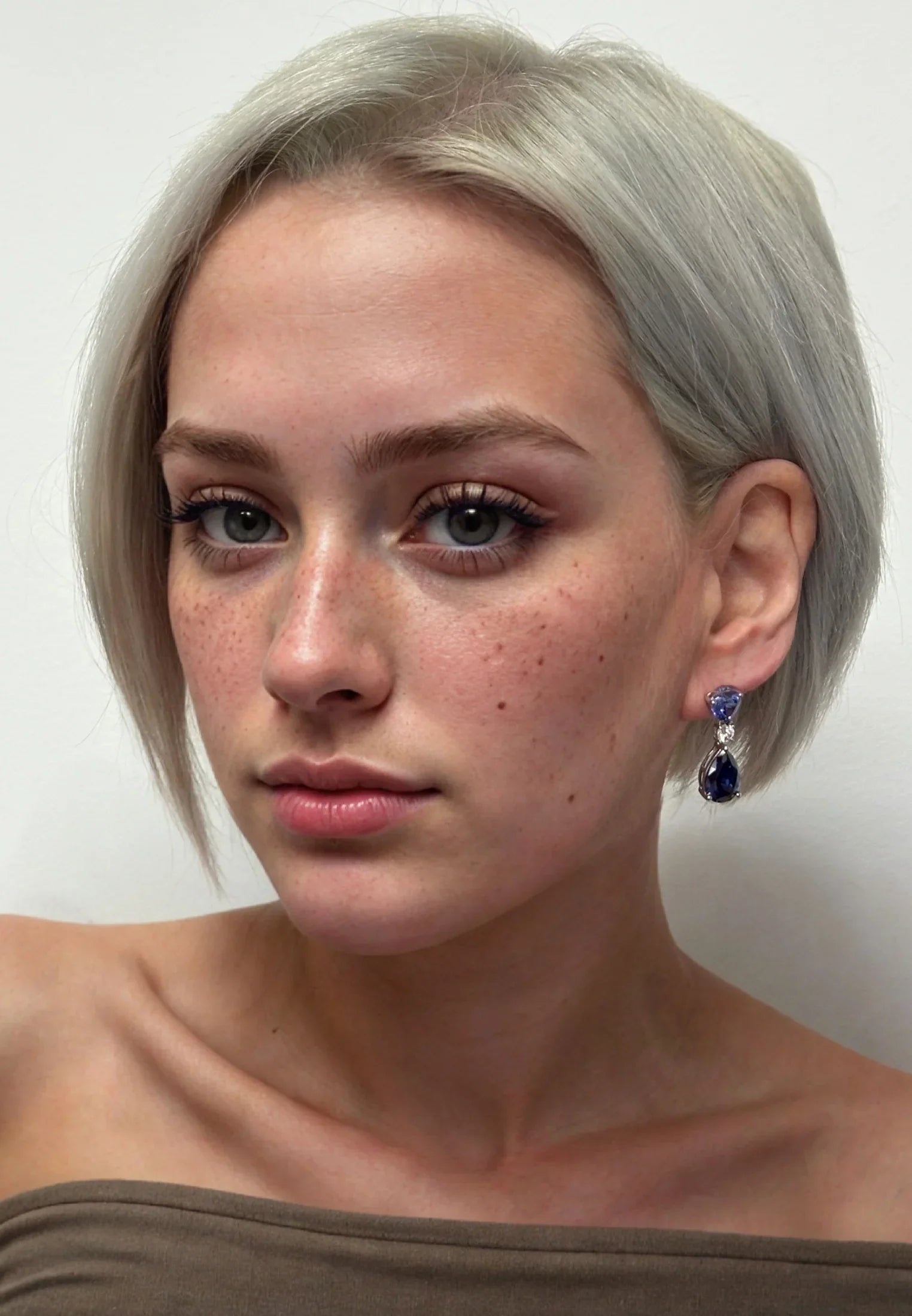 The earring worn by a model.