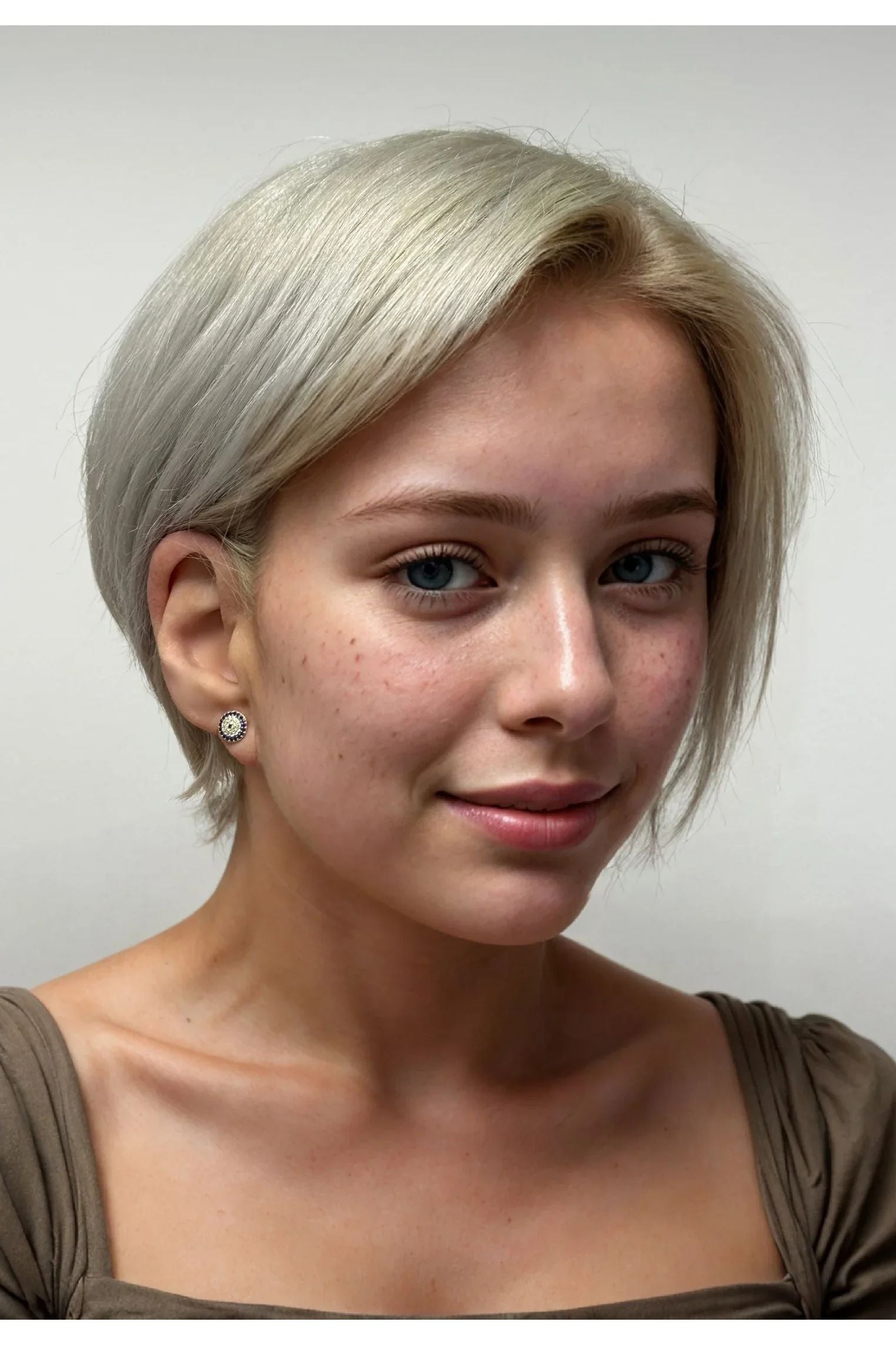 The earring worn by a model.