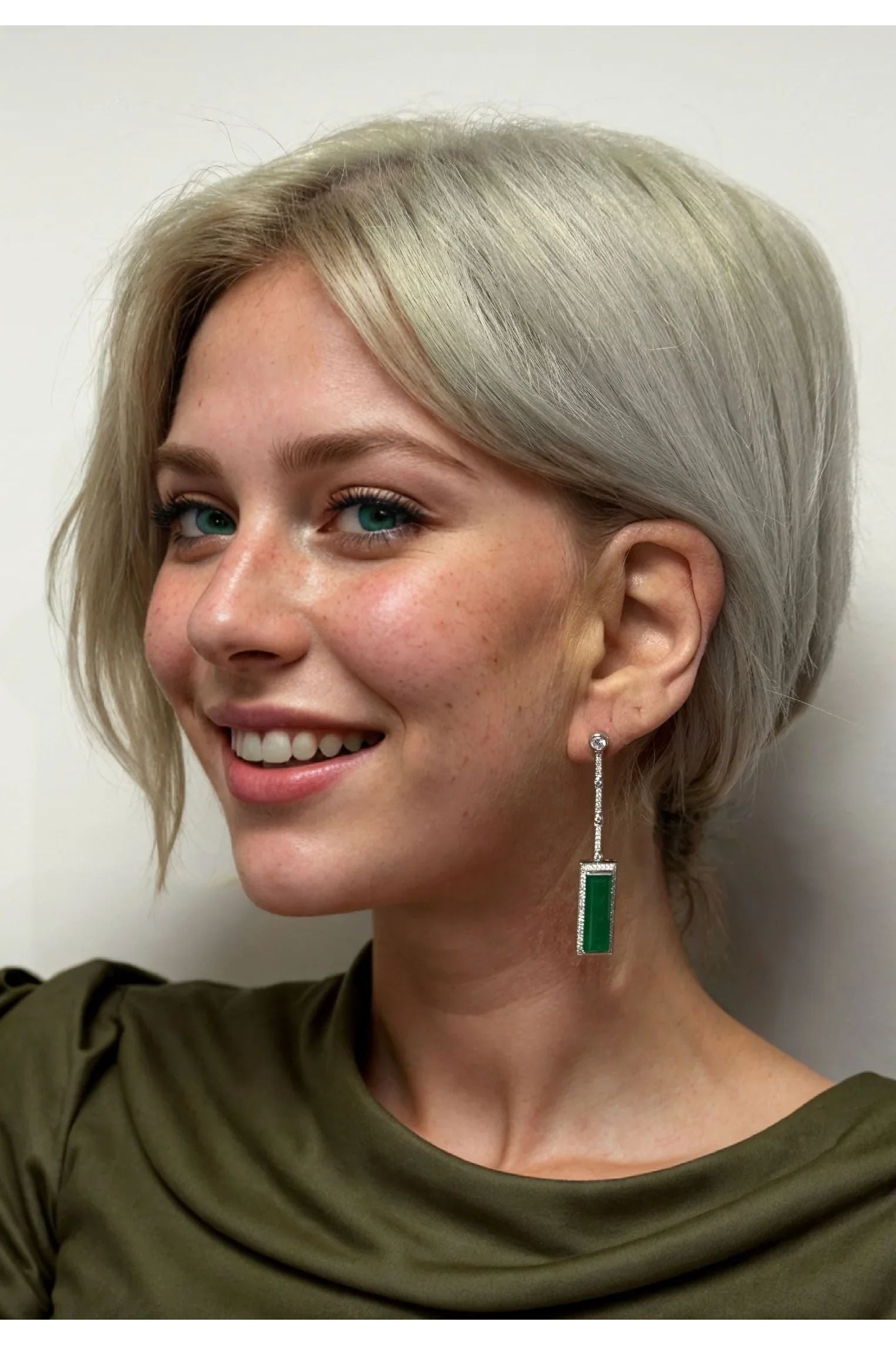 The earring worn by a model.