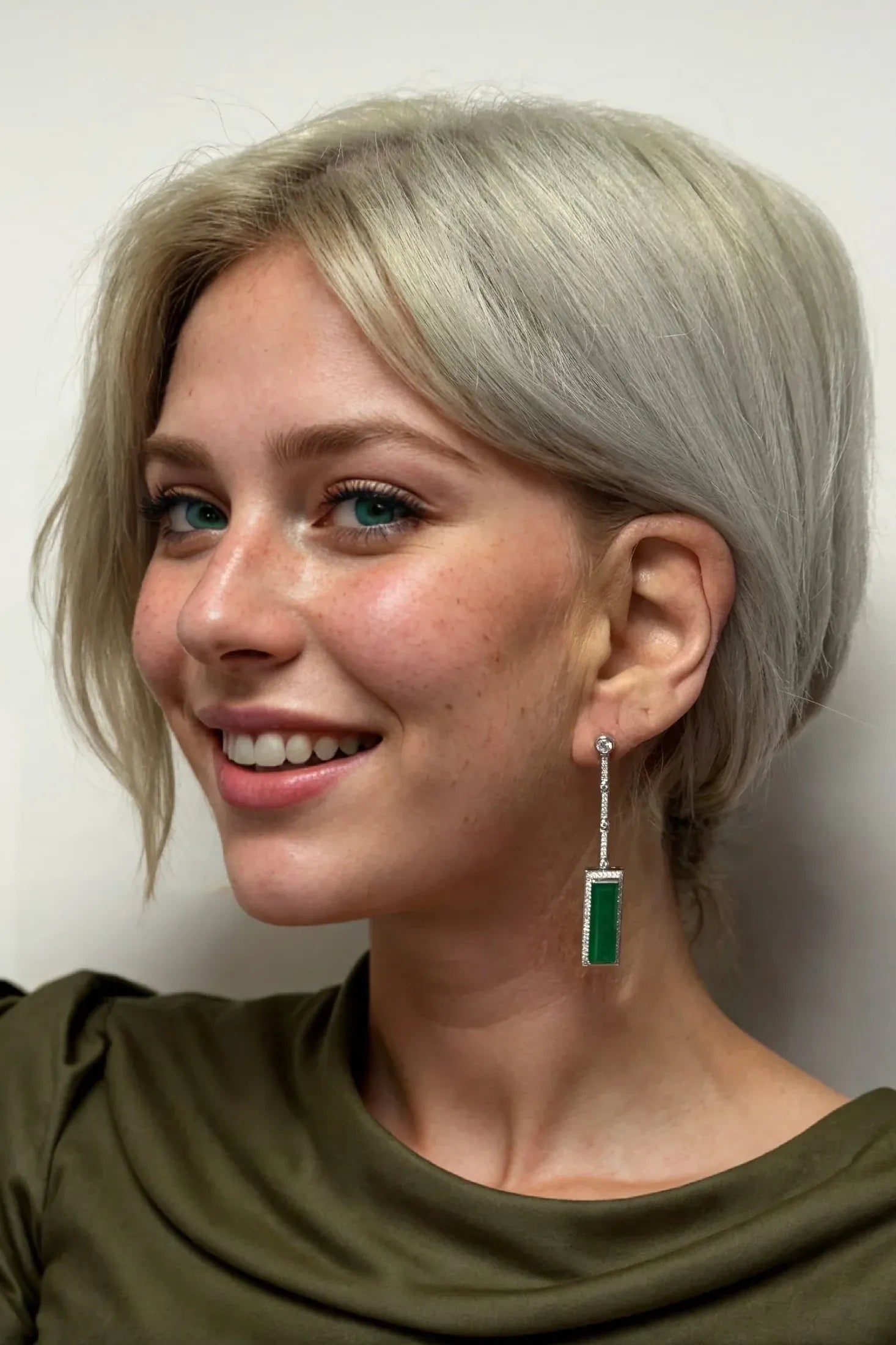 The earring worn by a model.