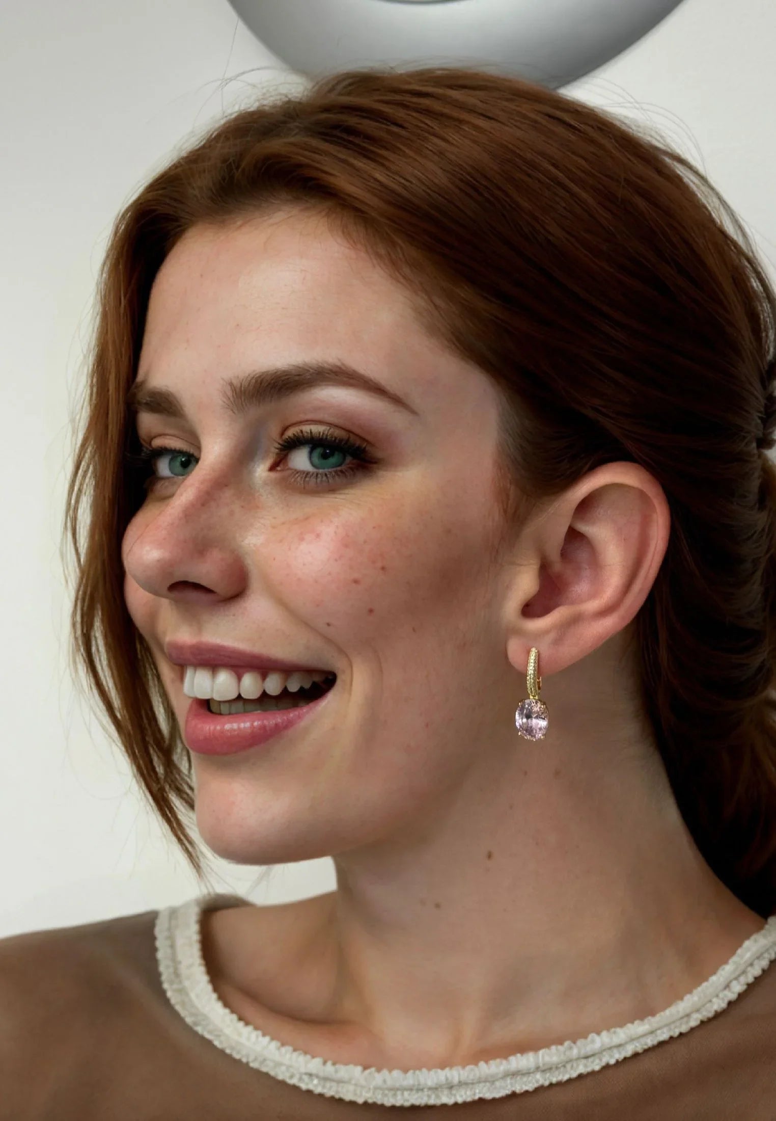 The earring worn by a model.