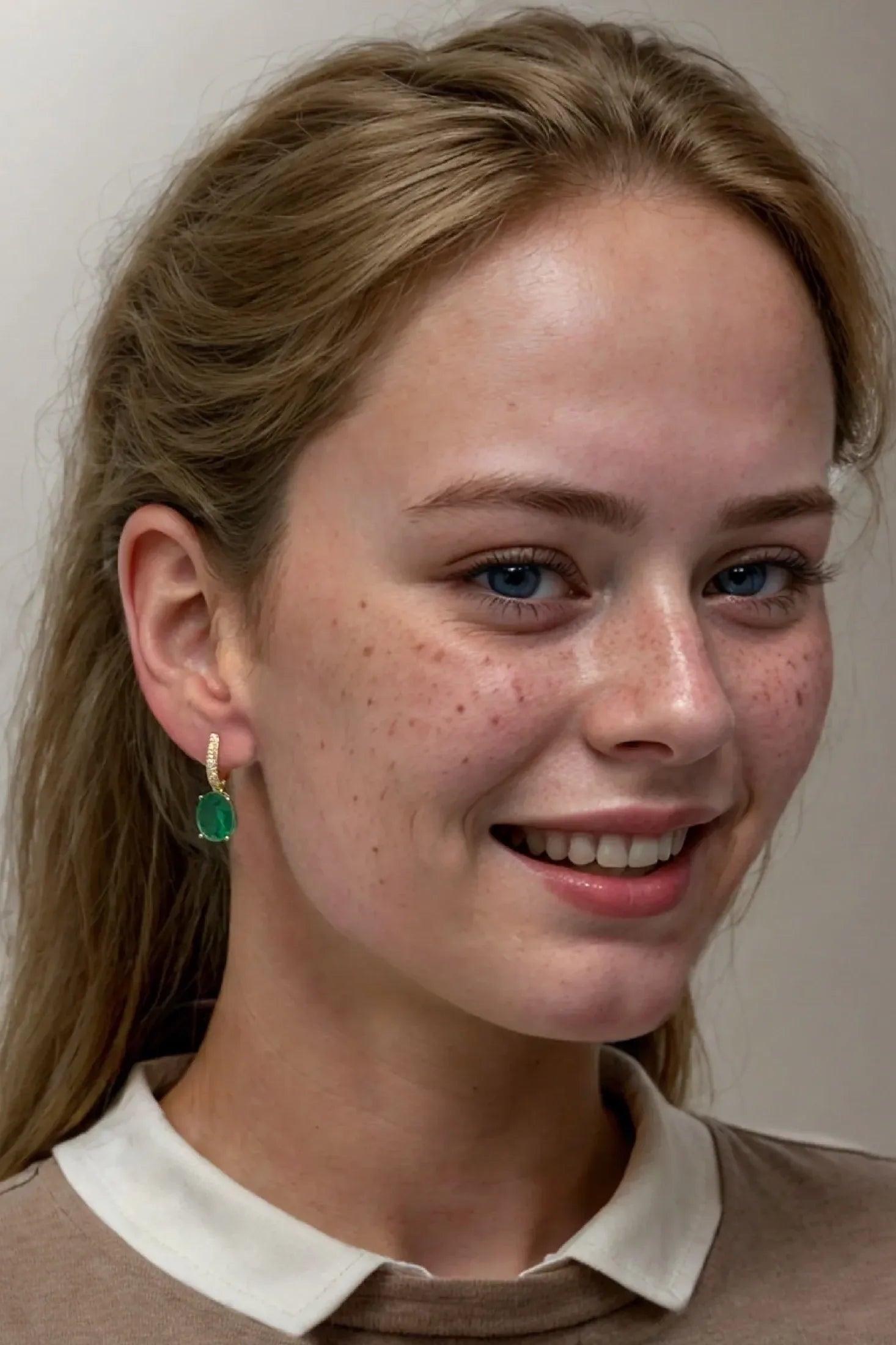 The earring worn by a model.