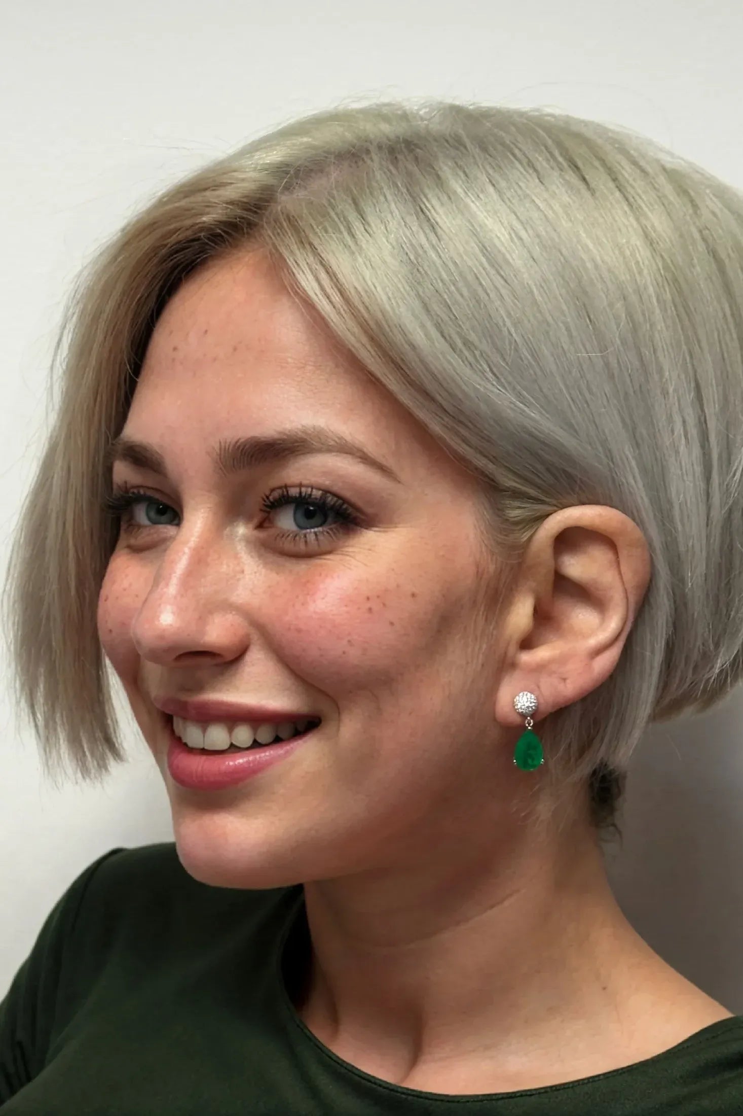 The earring worn by a model.