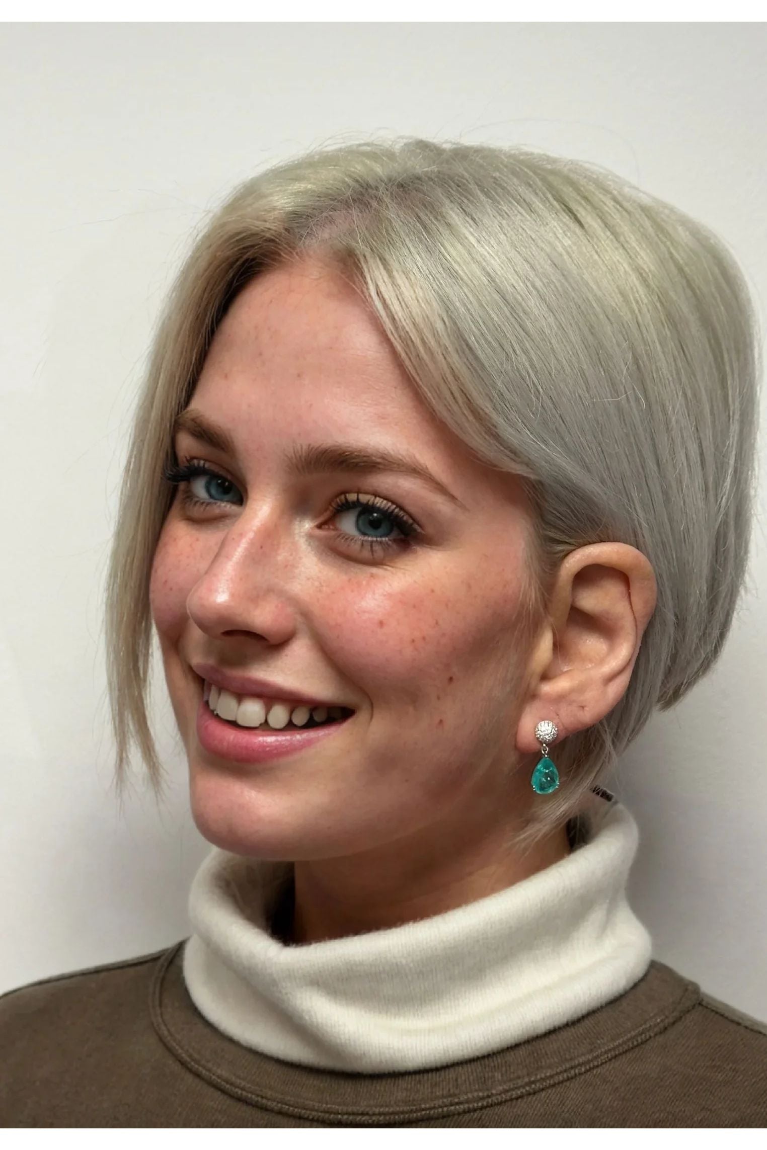 The earring worn by a model.