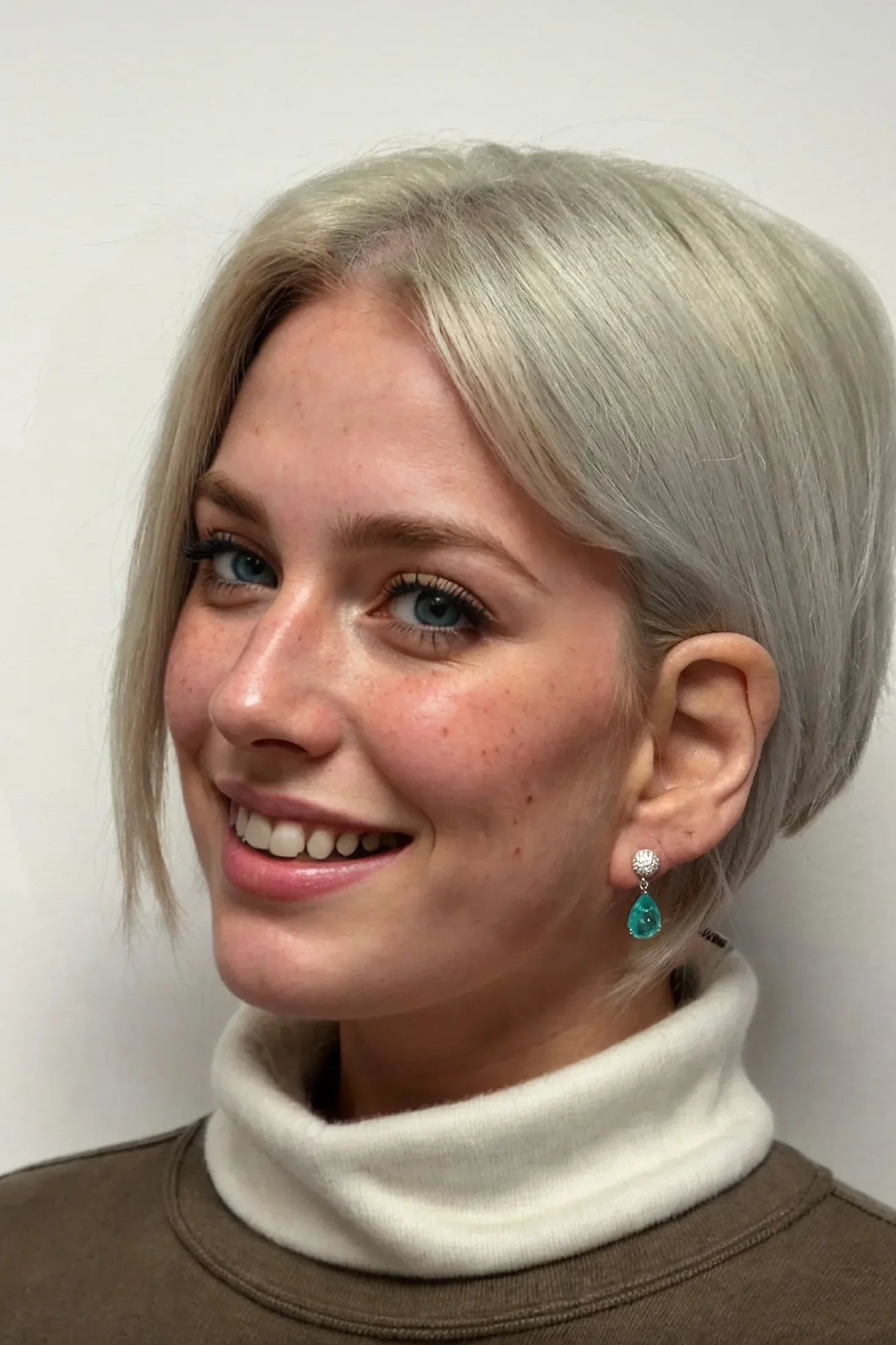 The earring worn by a model.