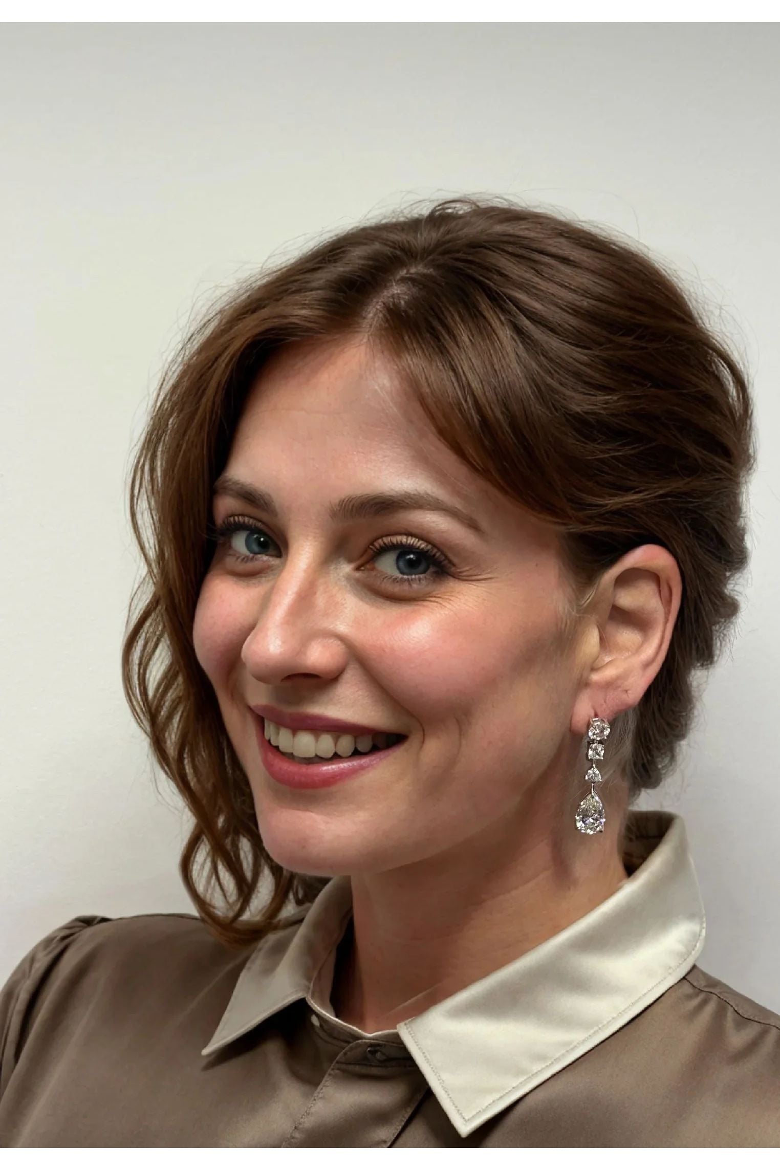 The earring worn by a model.