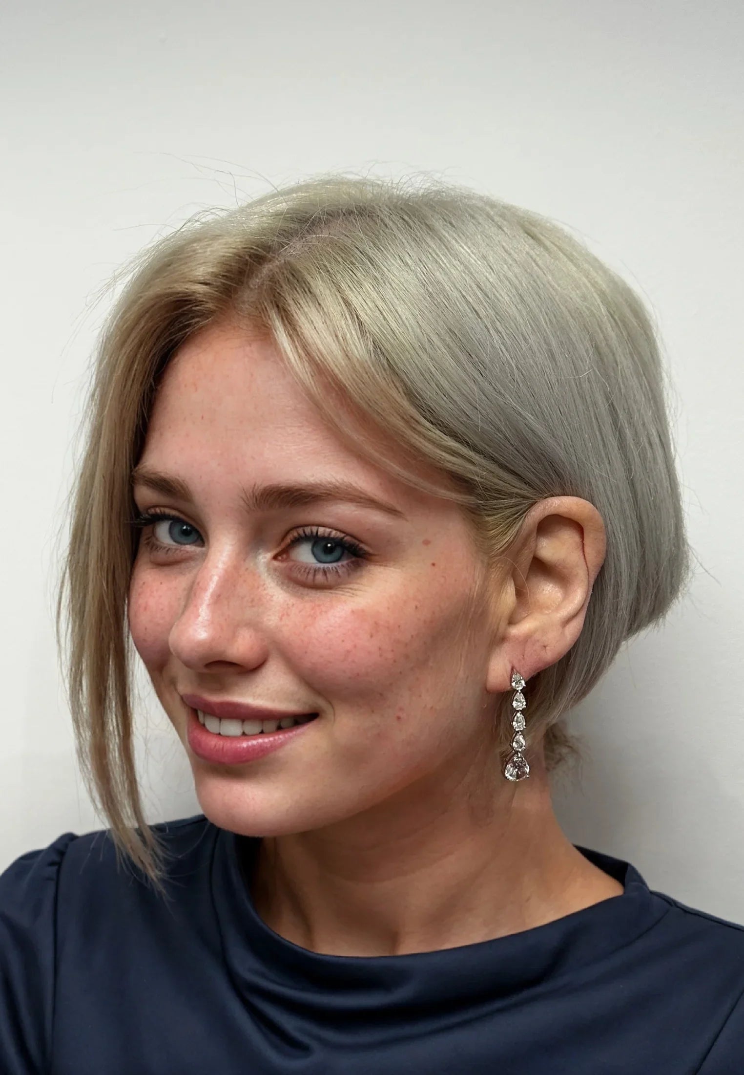 The earring worn by a model.