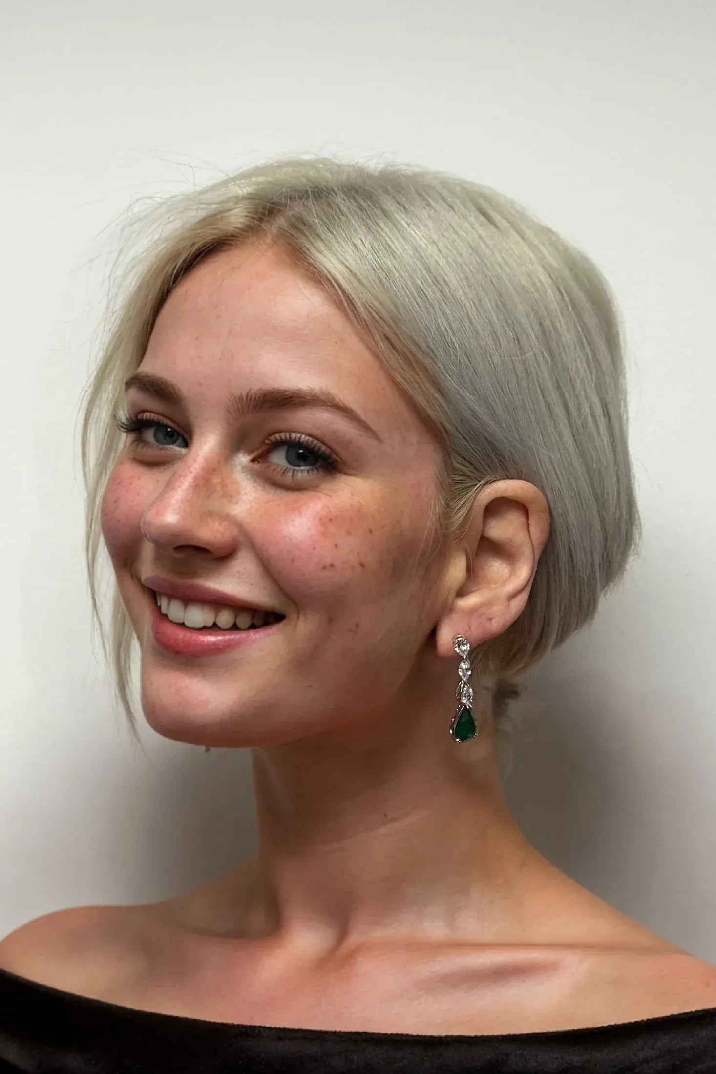 The earring worn by a model.