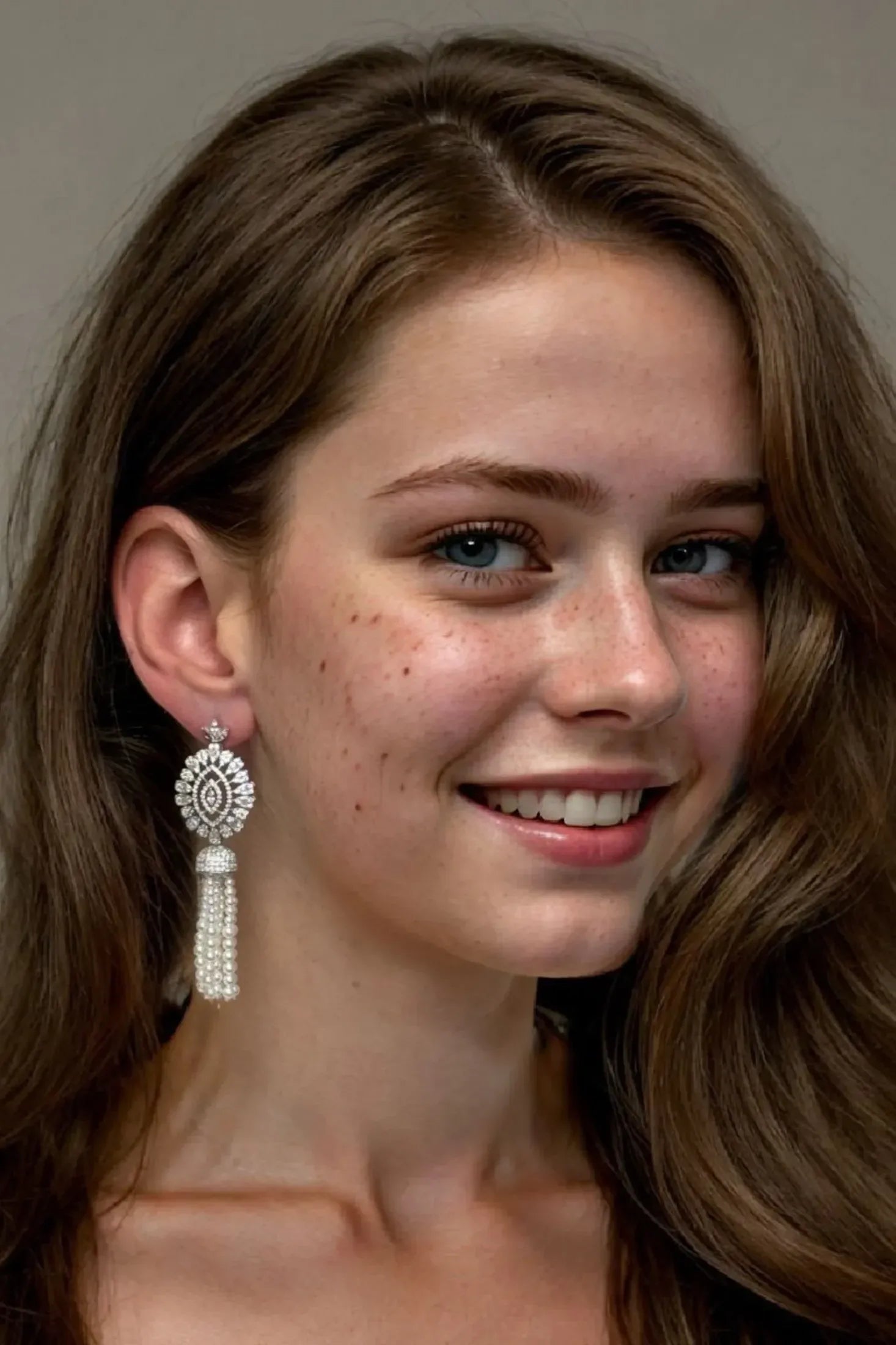 The earring worn by a model.
