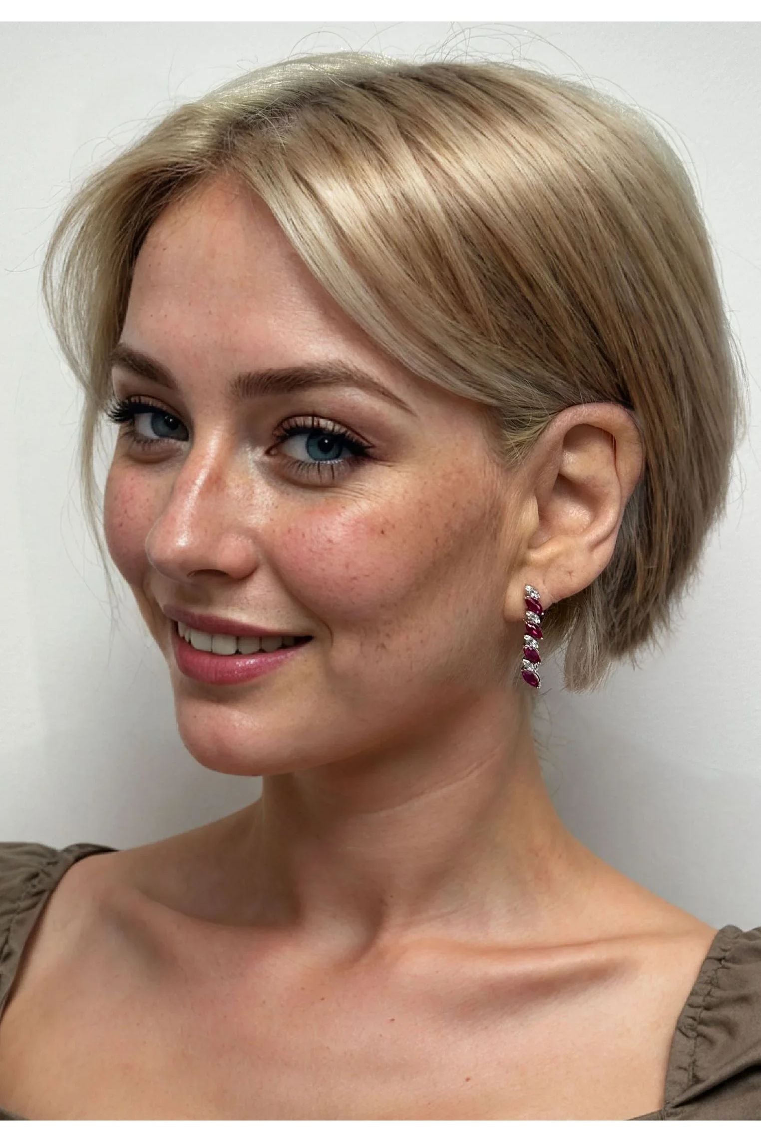 The earring worn by a model.