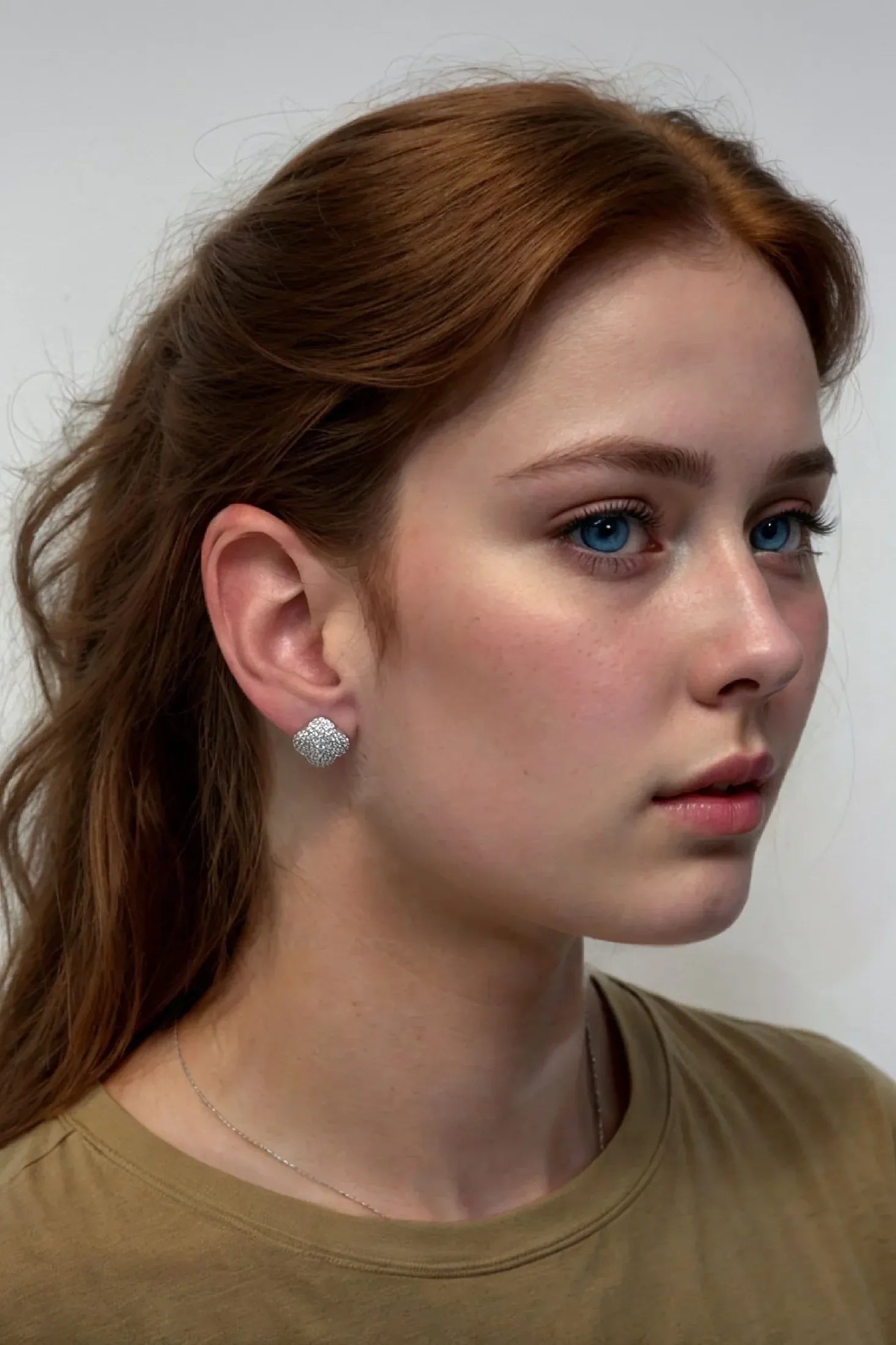 The earring worn by a model.