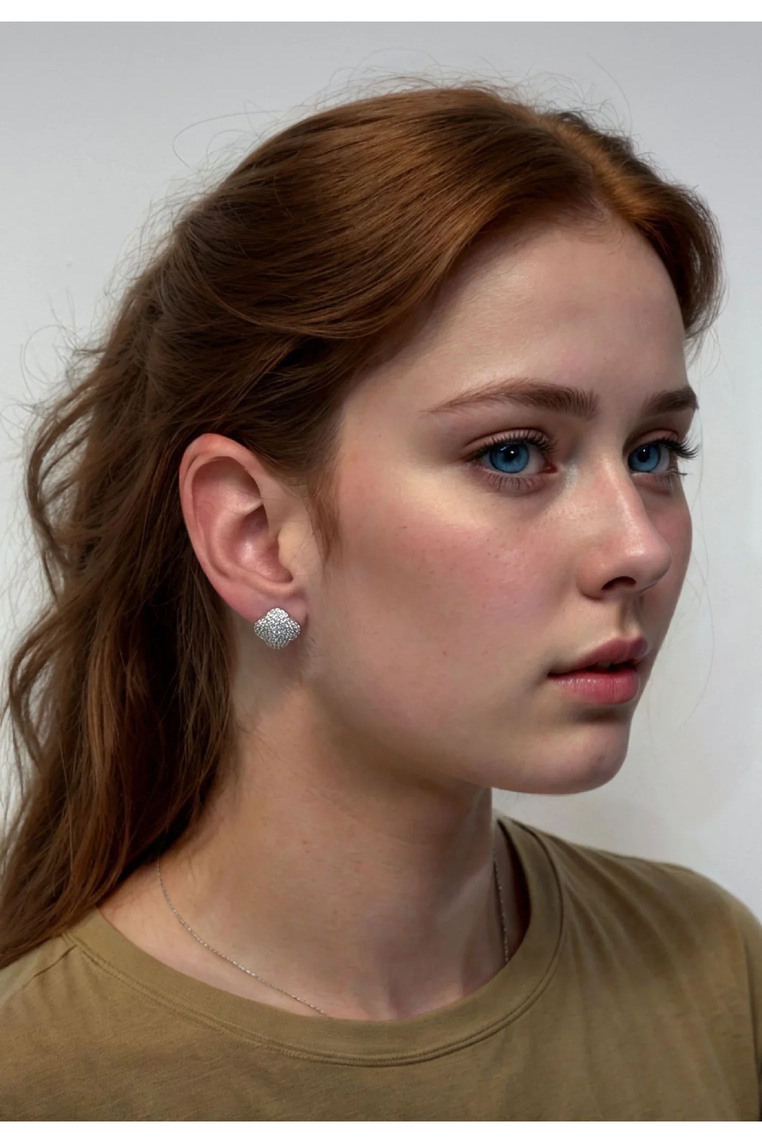 The earring worn by a model.