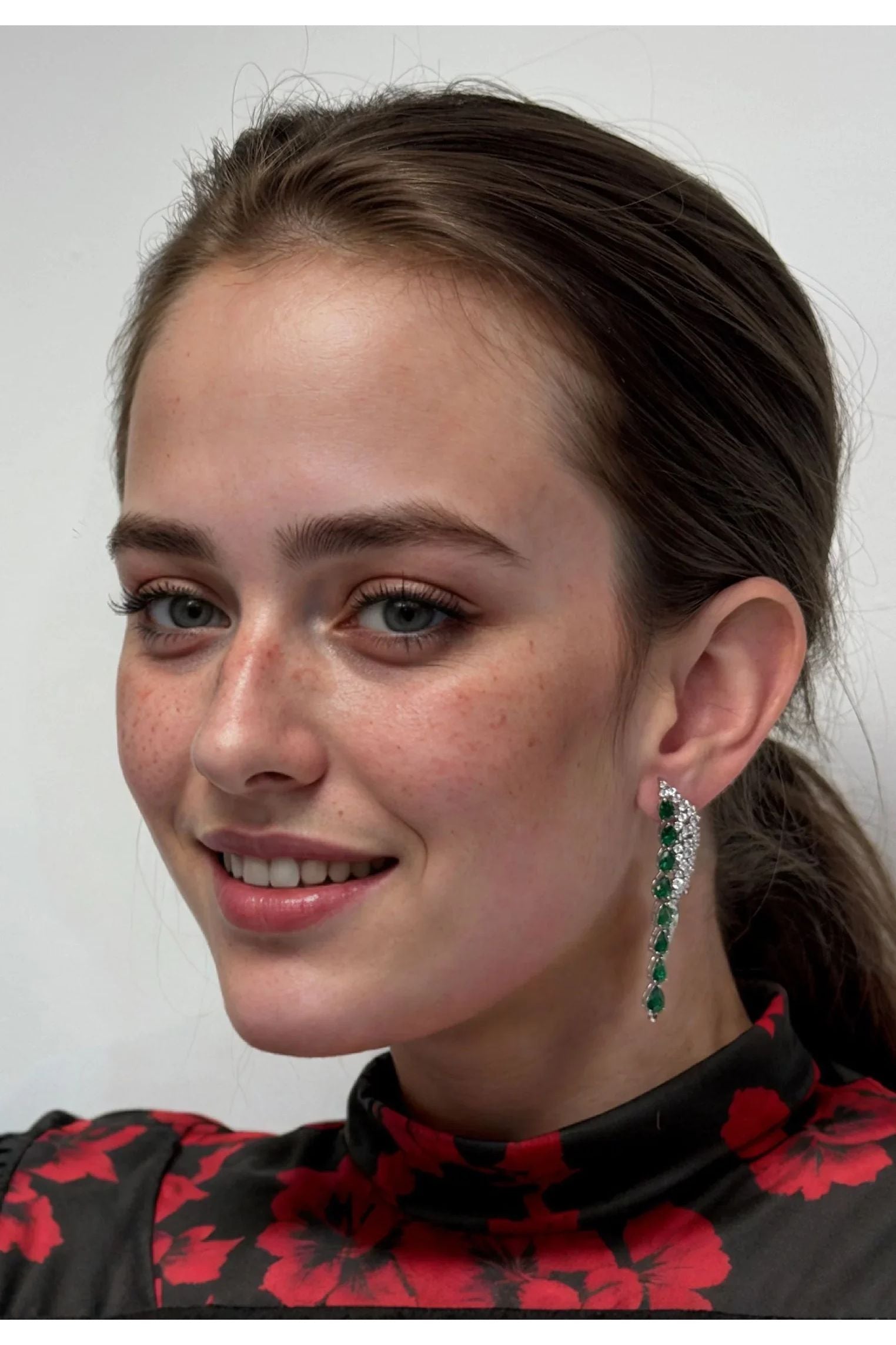 The earring worn by a model.