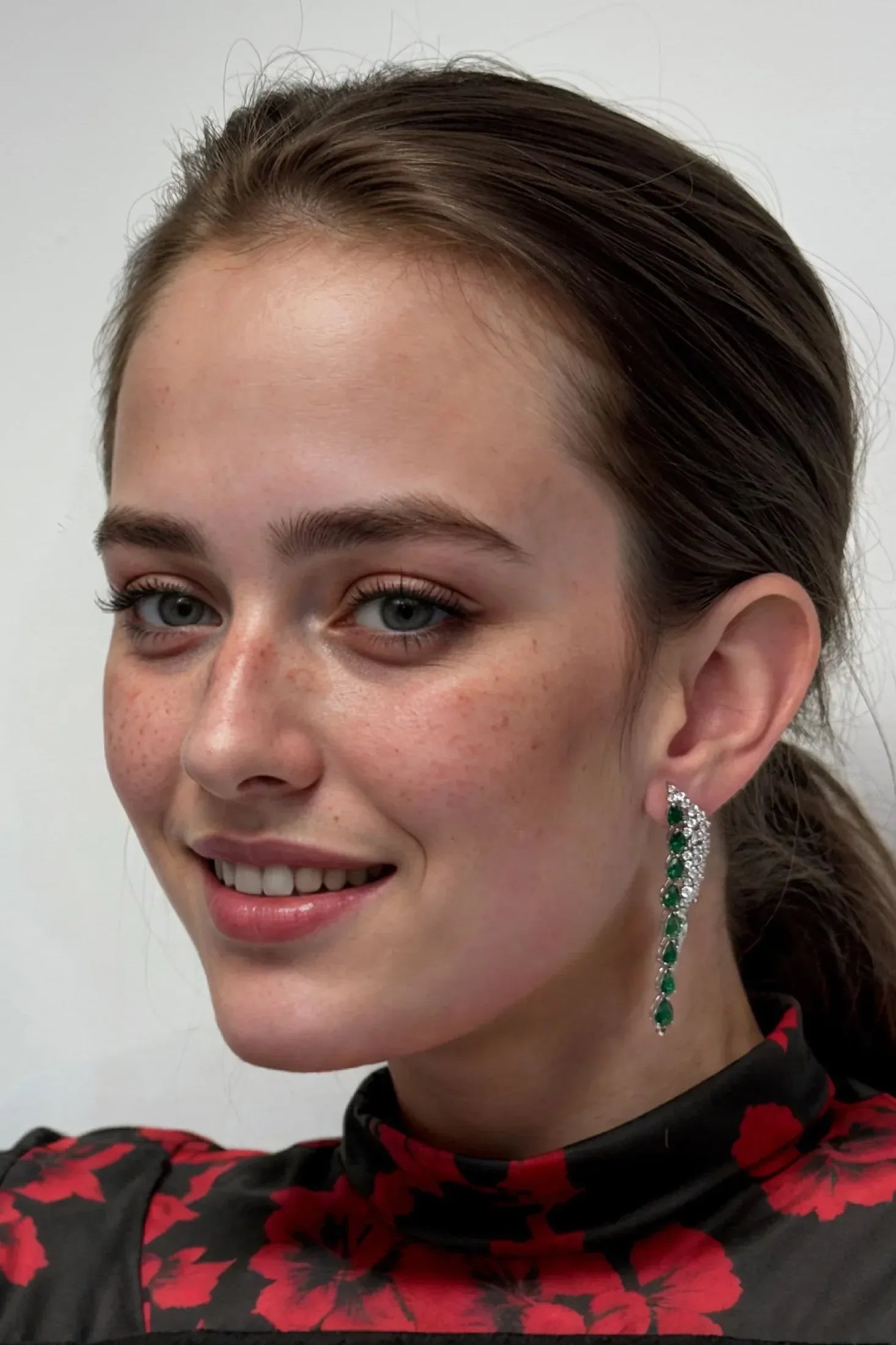 The earring worn by a model.