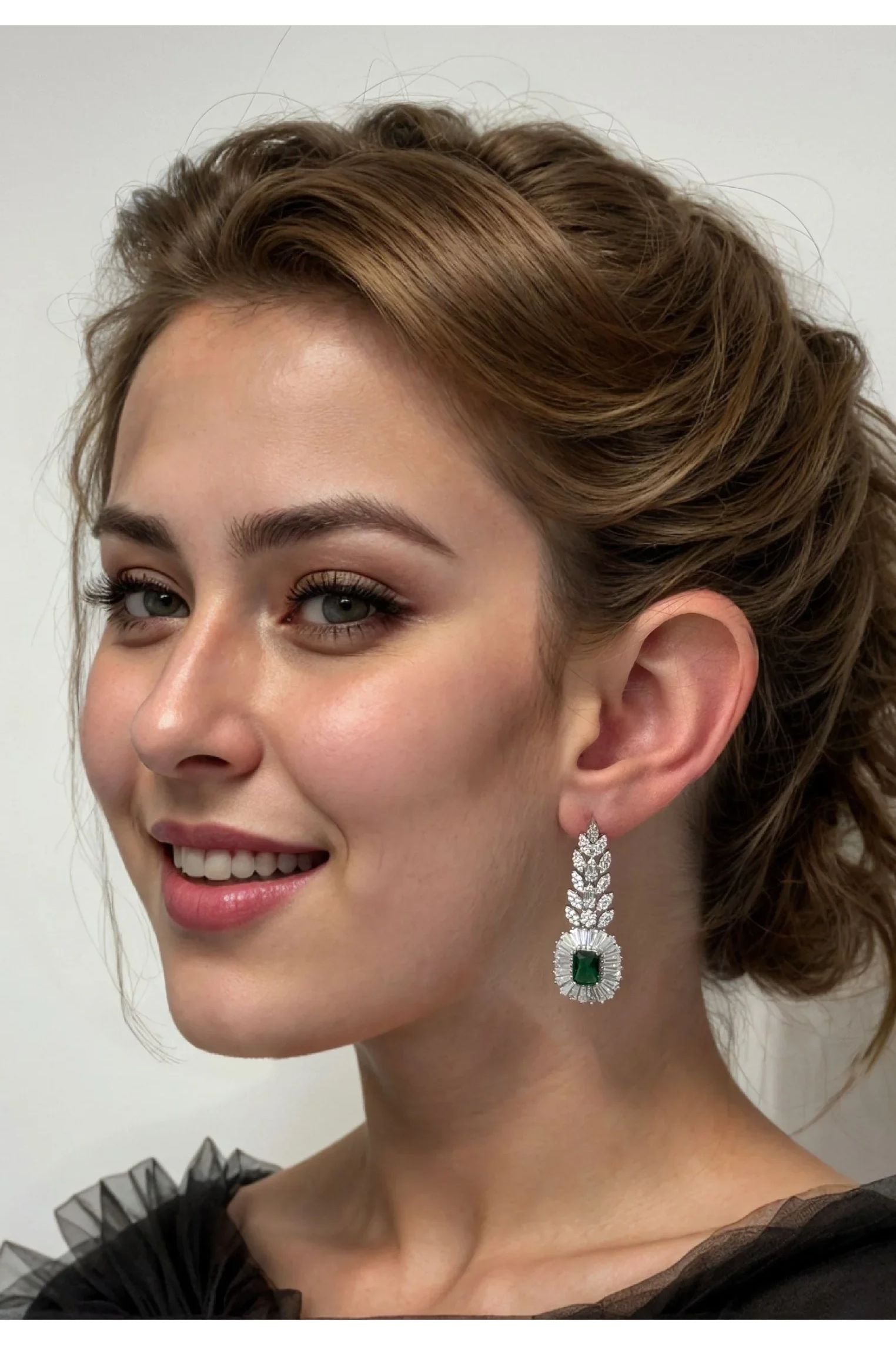 The earring worn by a model.