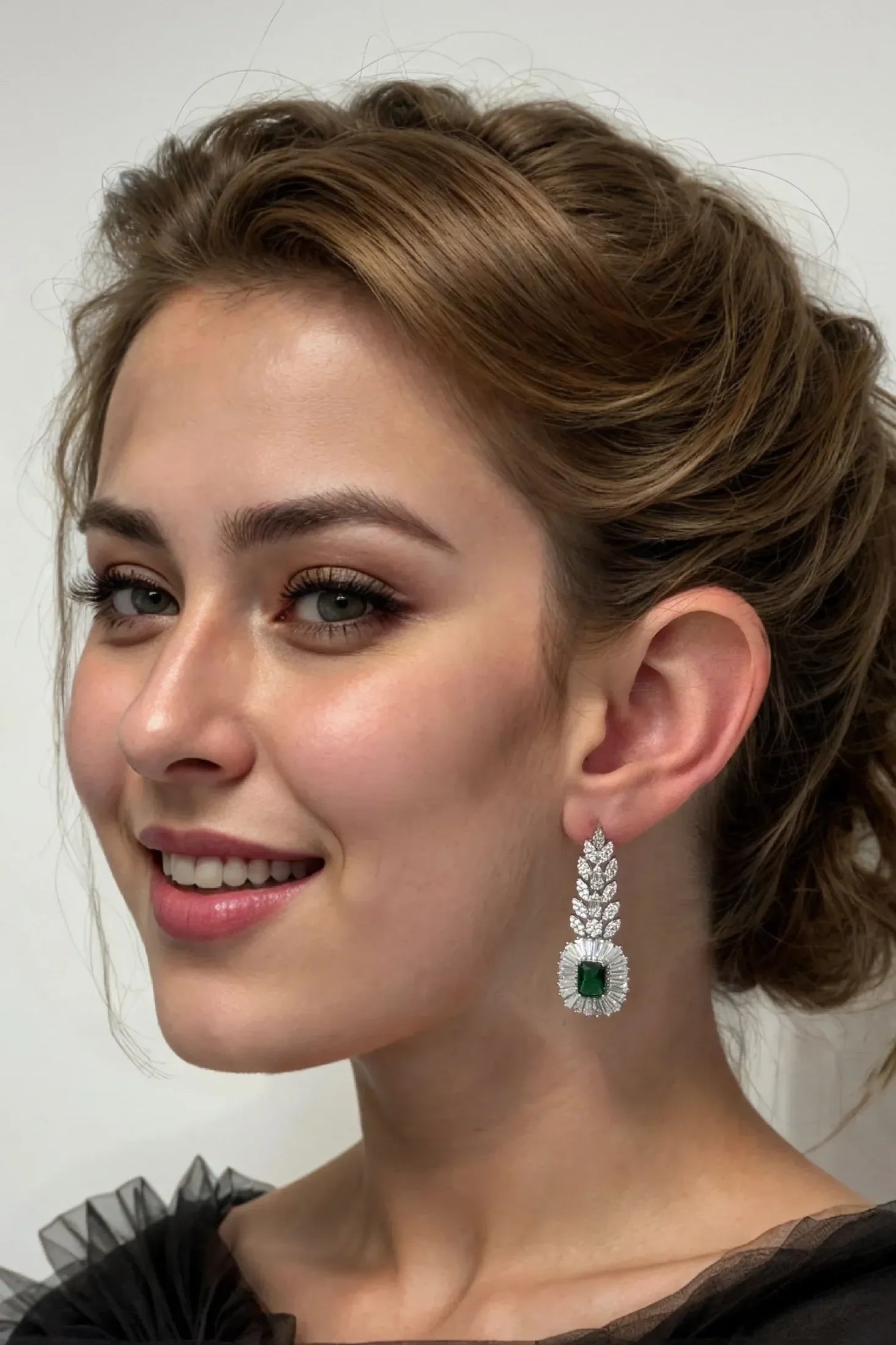 The earring worn by a model.