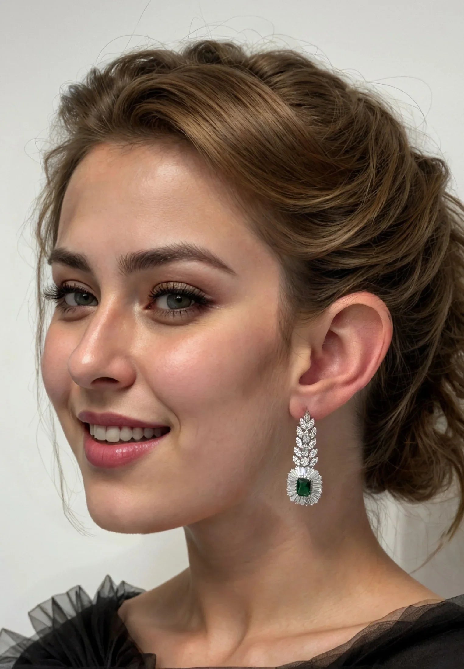 The earring worn by a model.