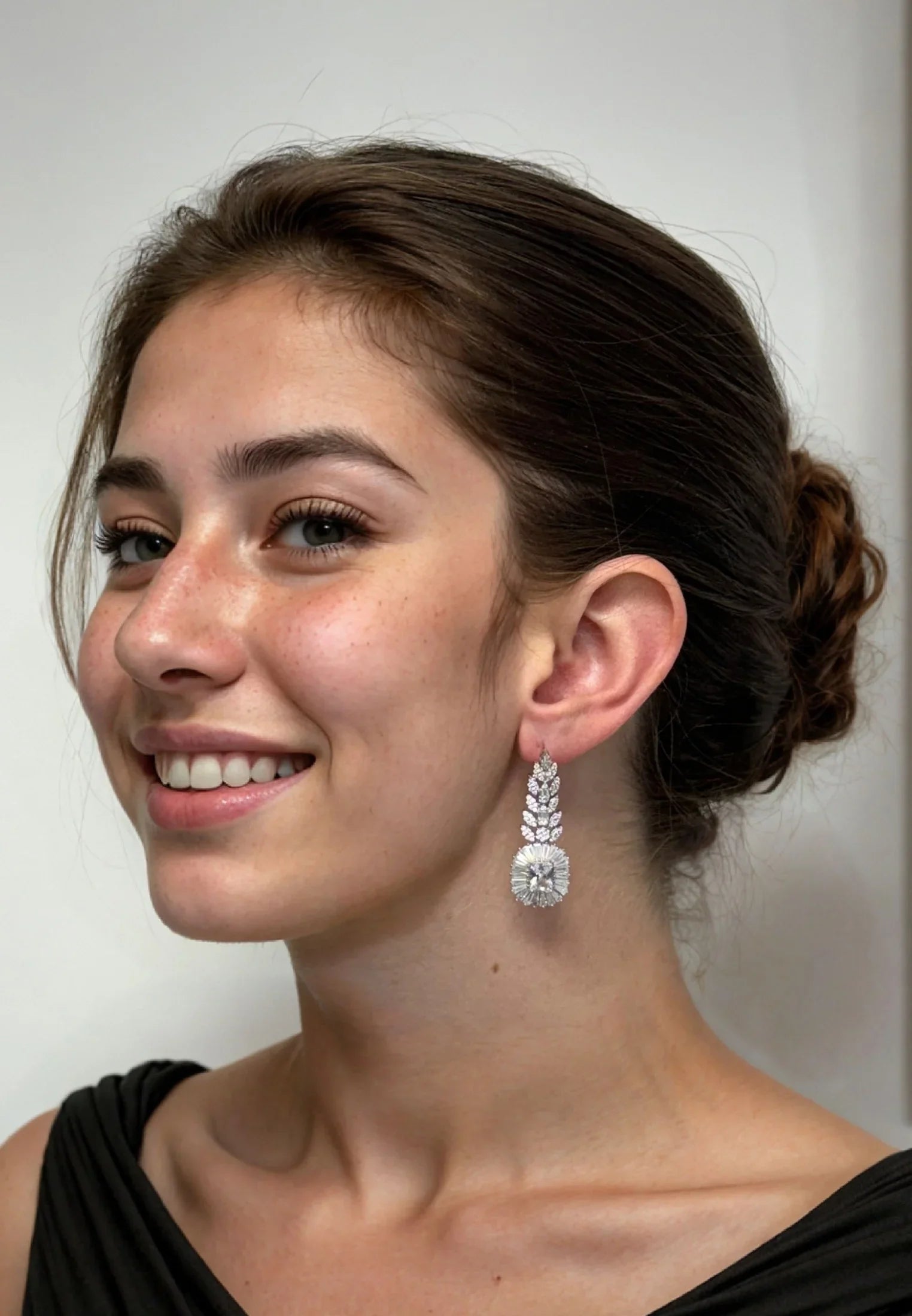 The earring worn by a model.