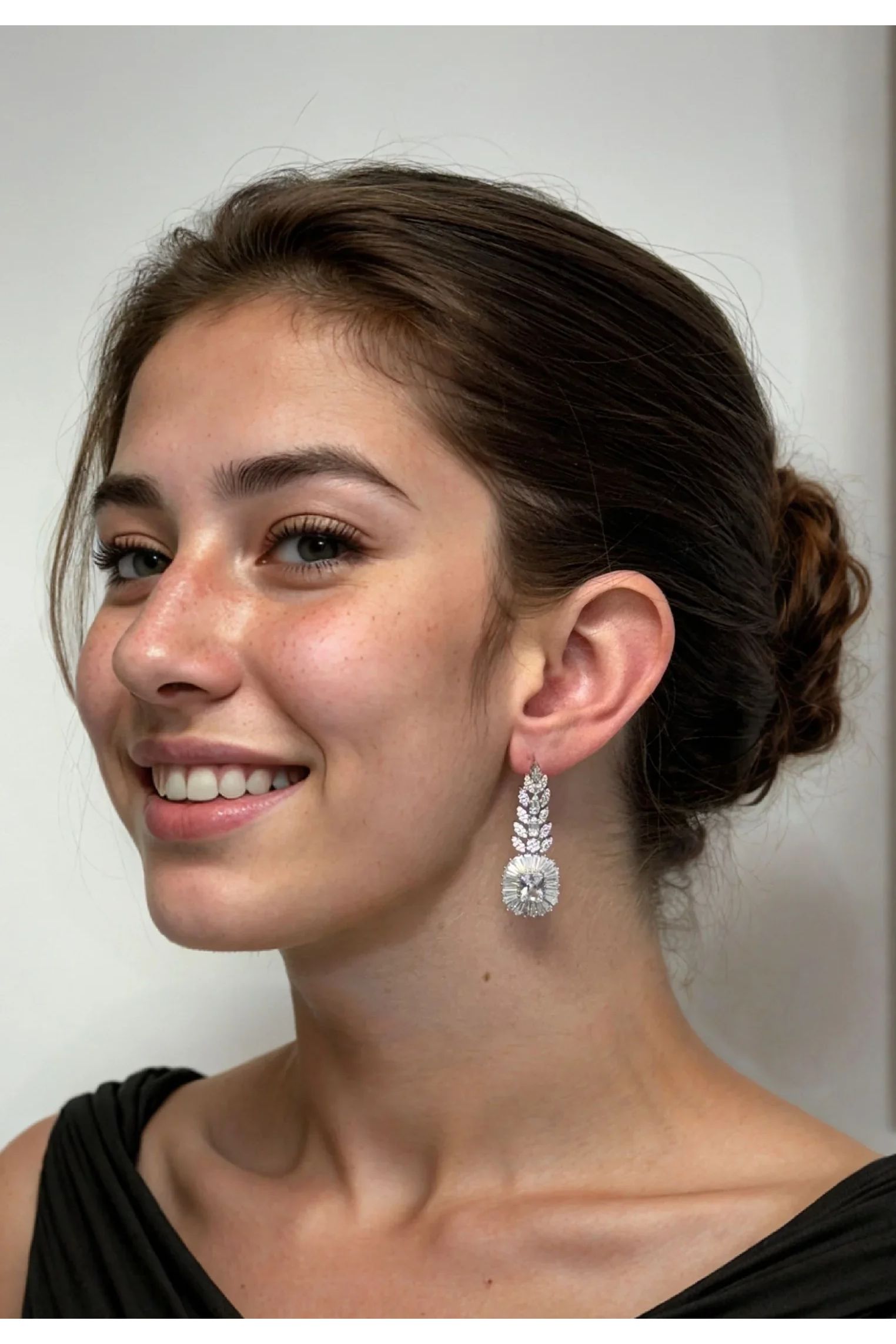 The earring worn by a model.