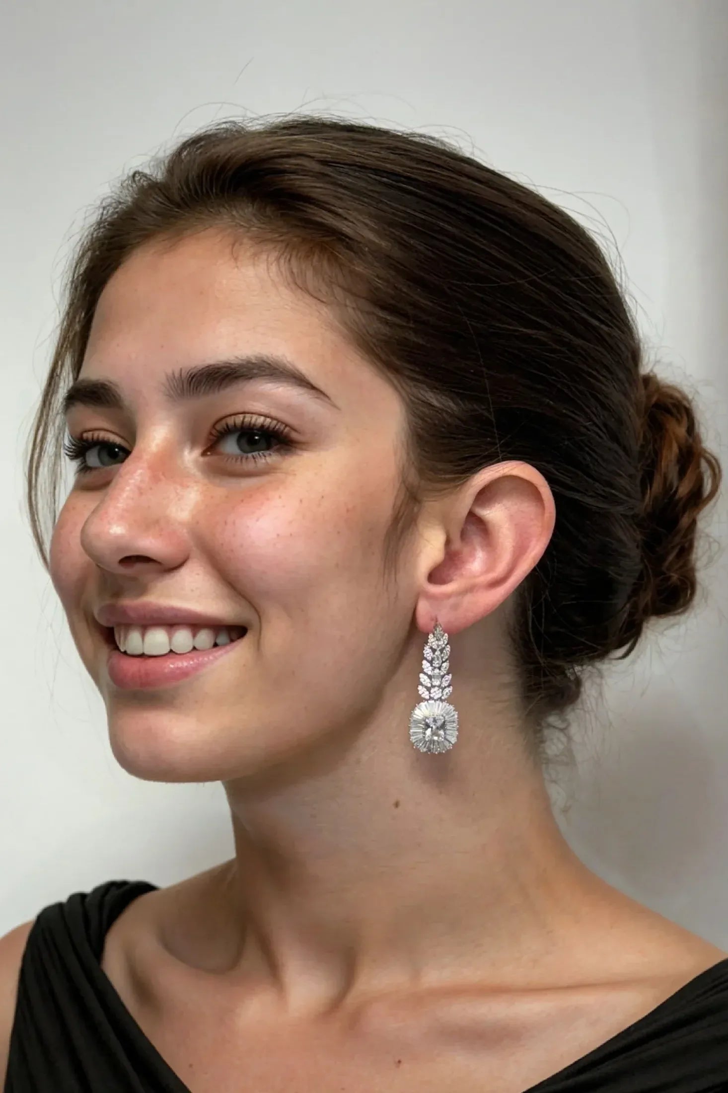 The earring worn by a model.