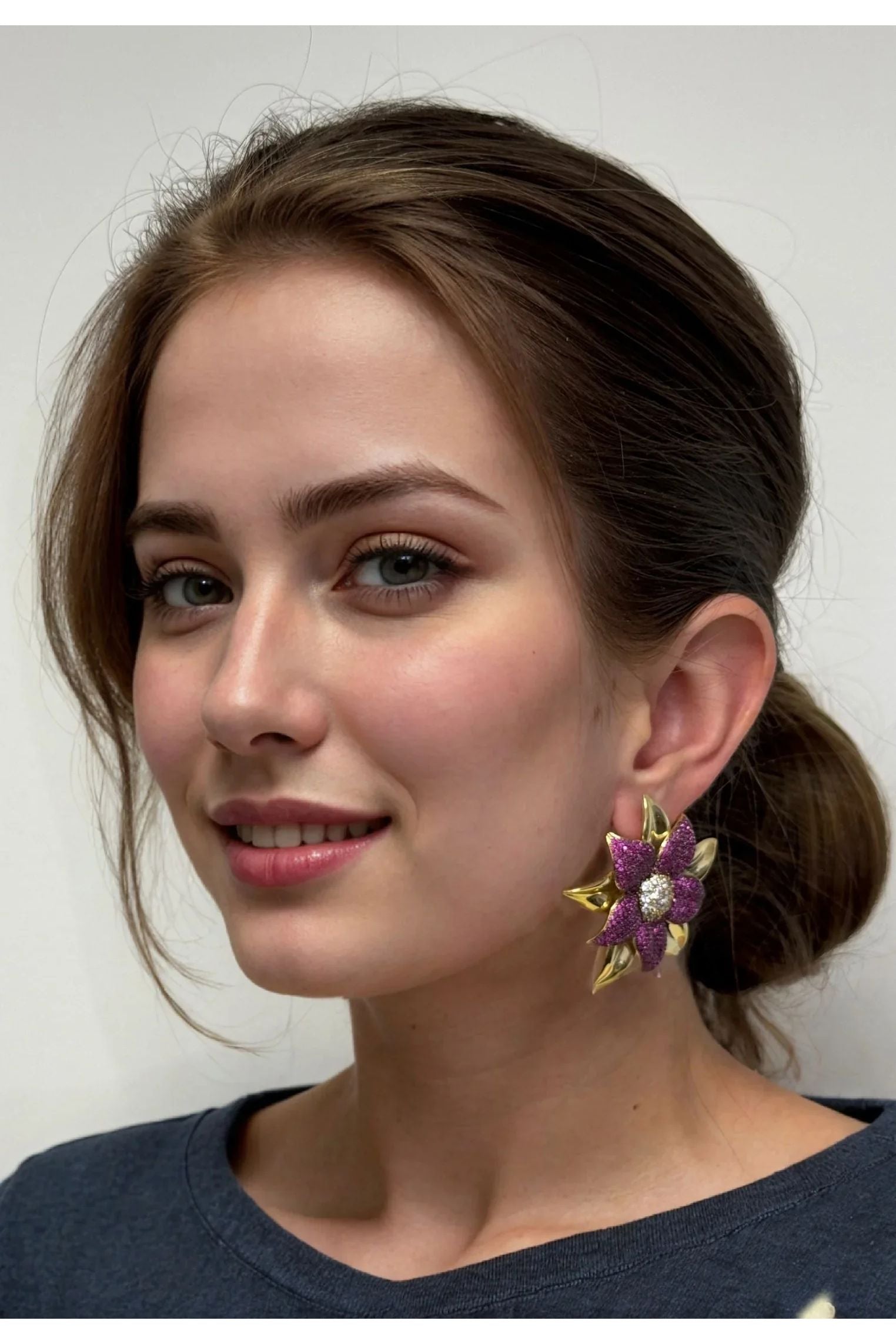 The earring worn by a model.