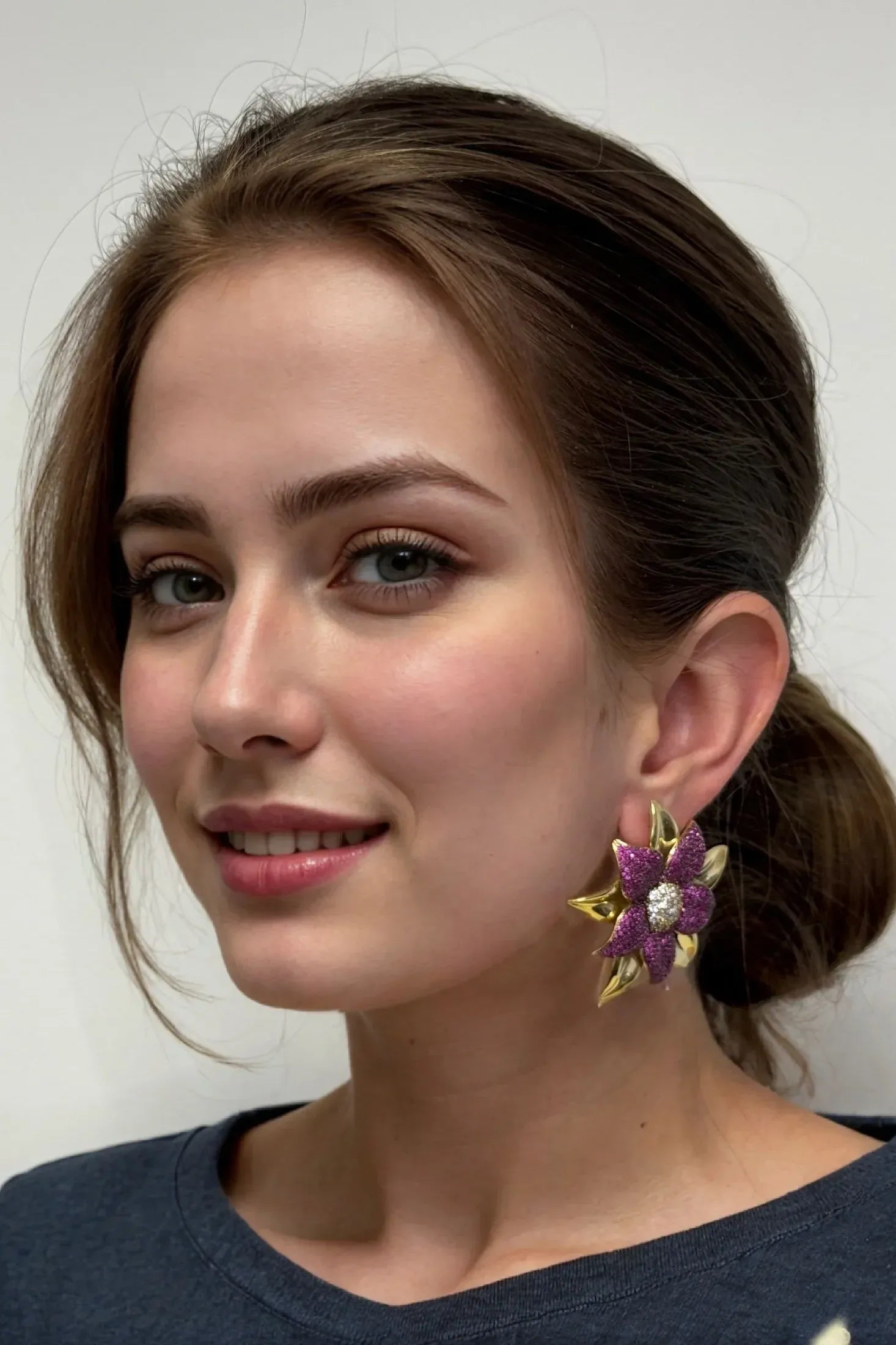 The earring worn by a model.