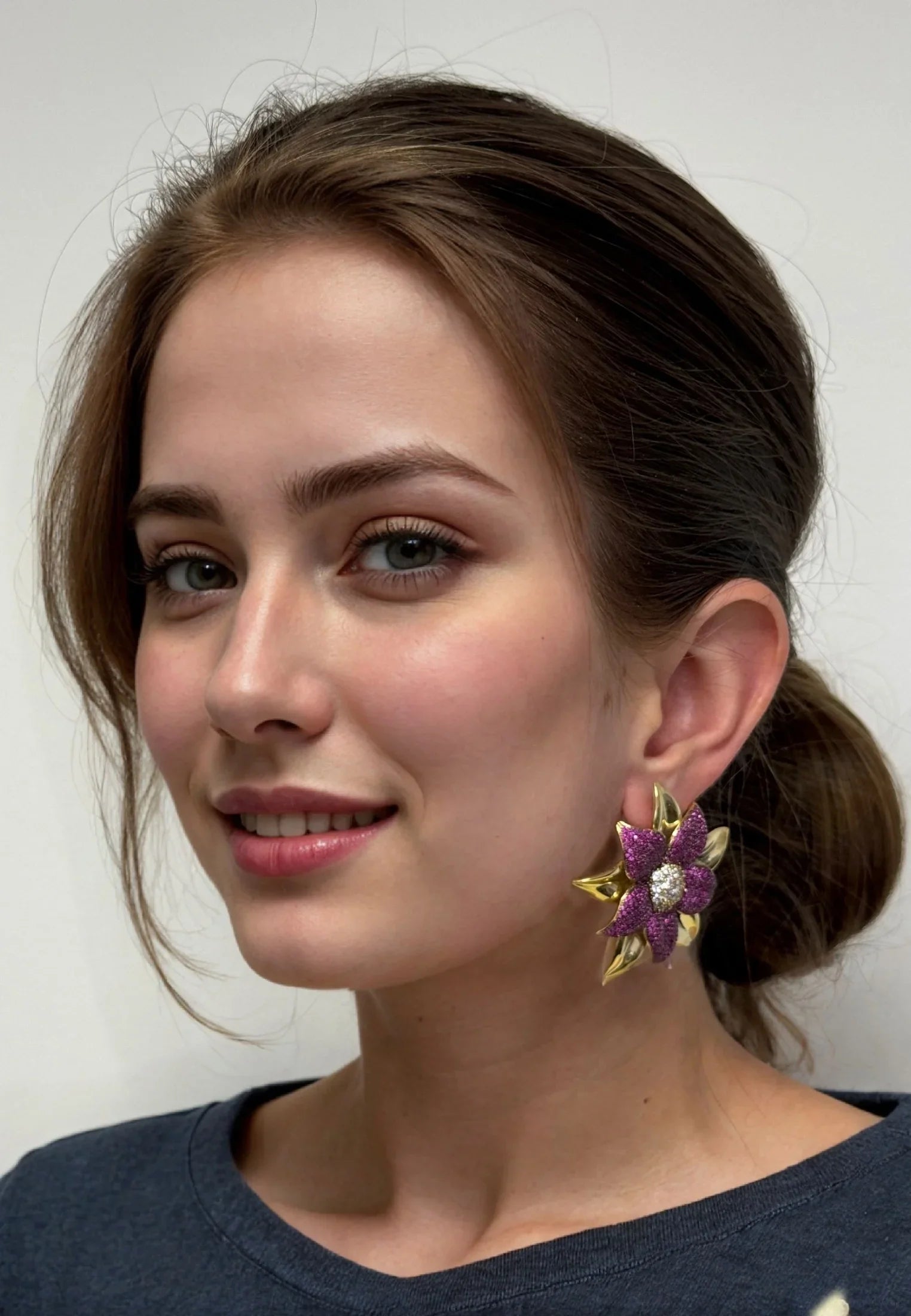 The earring worn by a model.