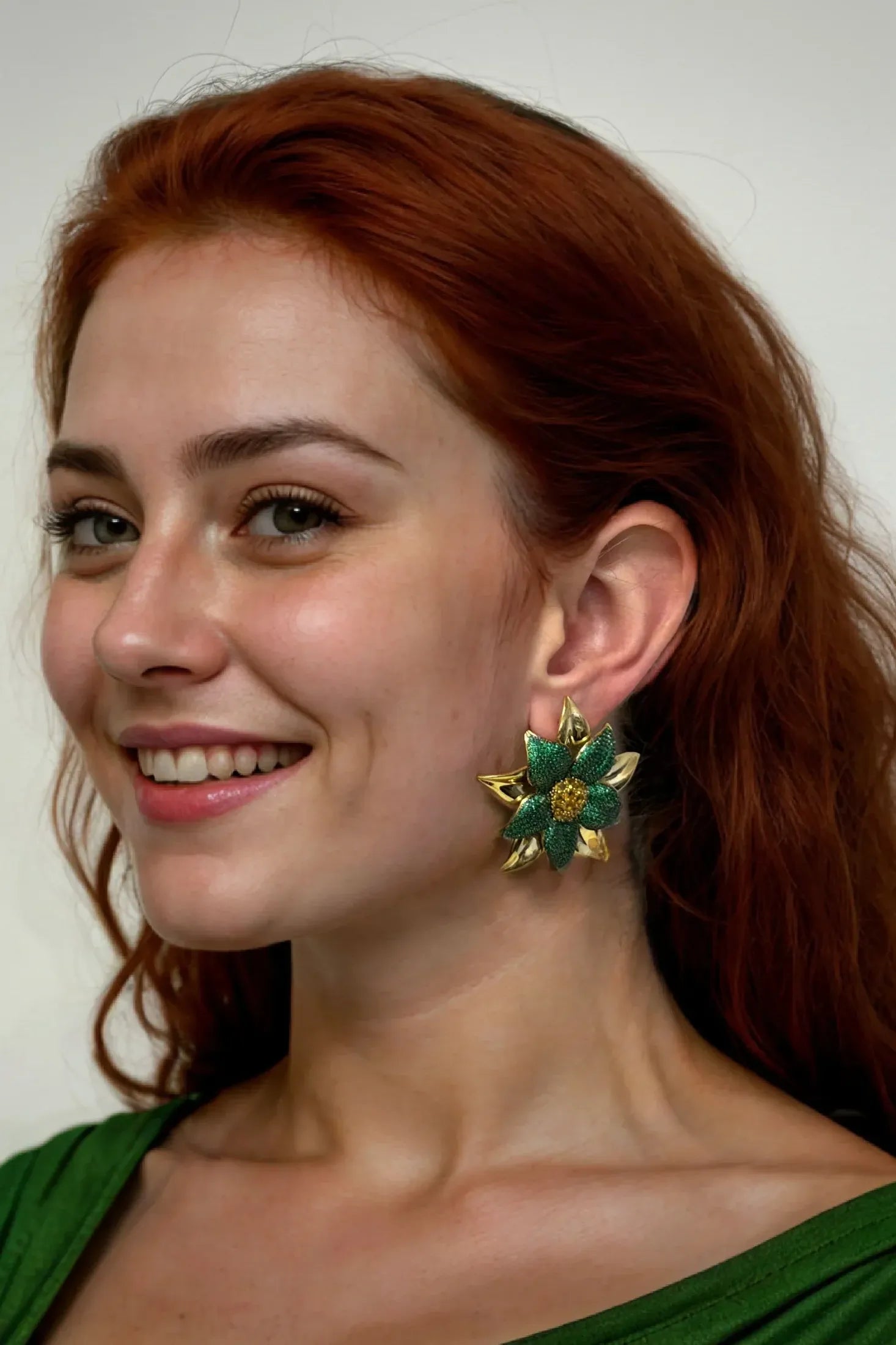 The earring worn by a model.
