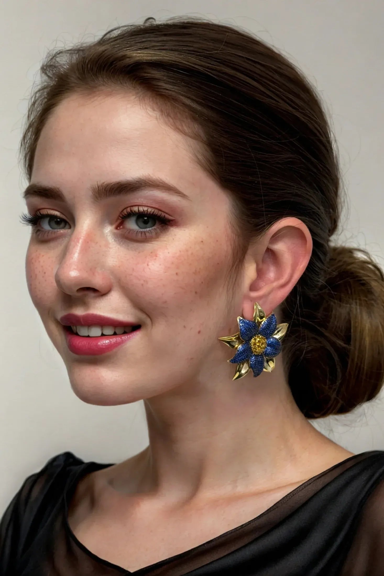 The earring worn by a model.