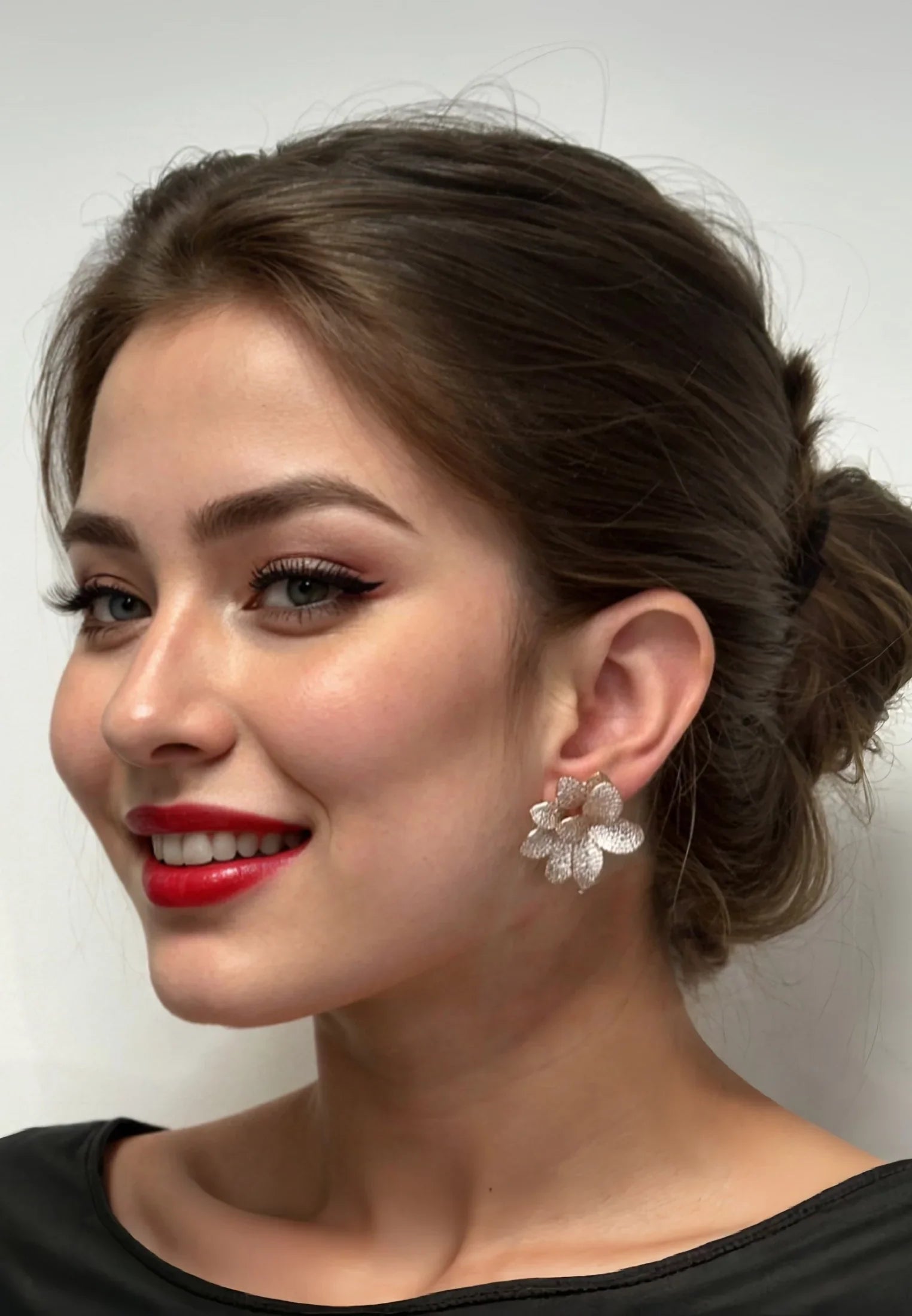 The earring worn by a model.