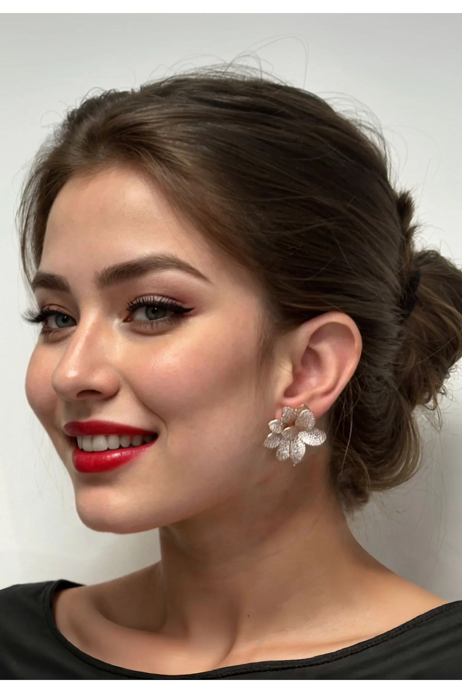 The earring worn by a model.