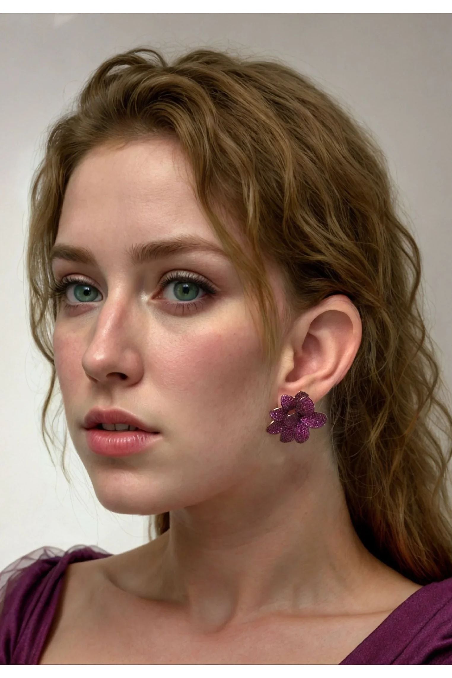 The earring worn by a model.