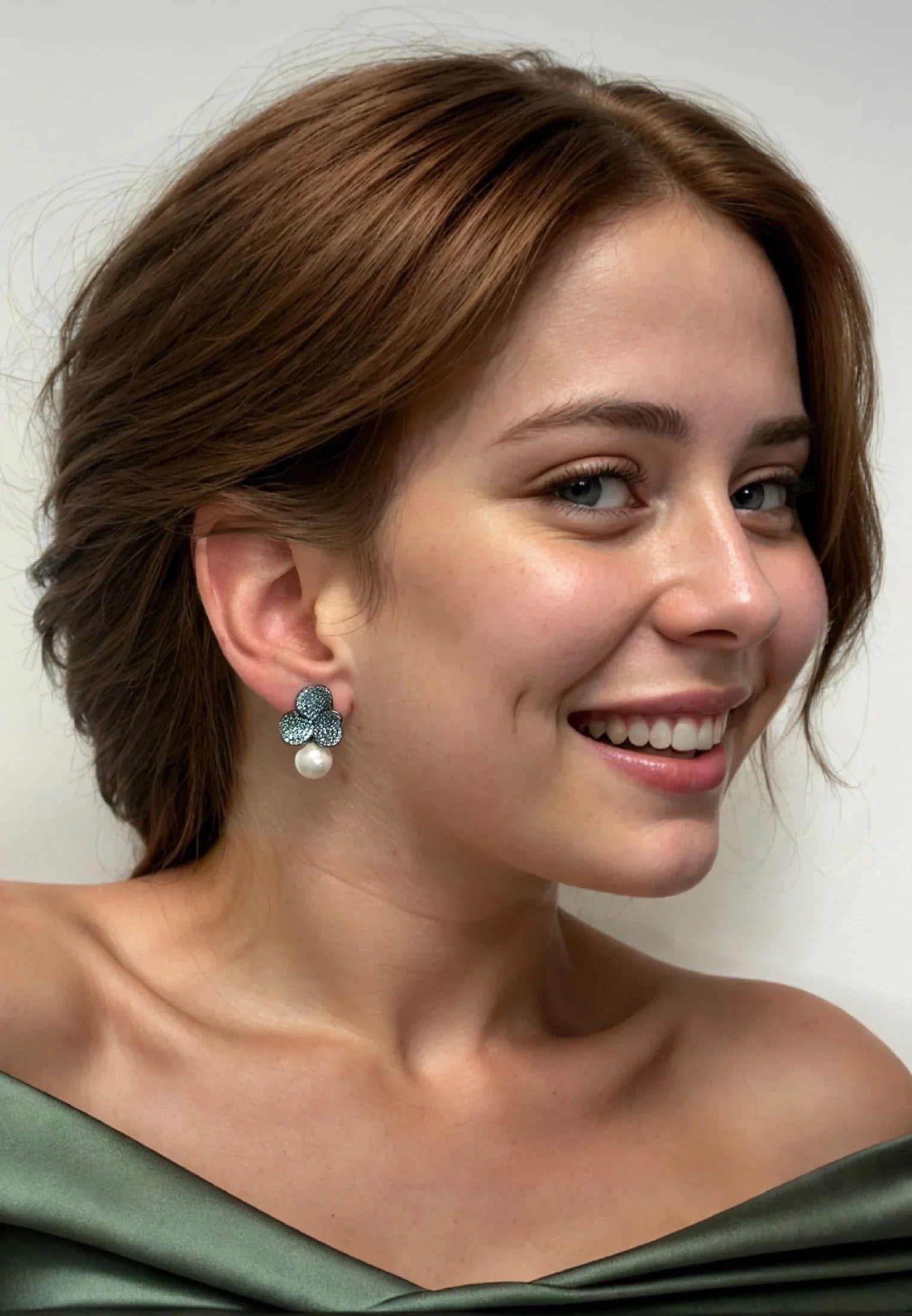 The earring worn by a model.