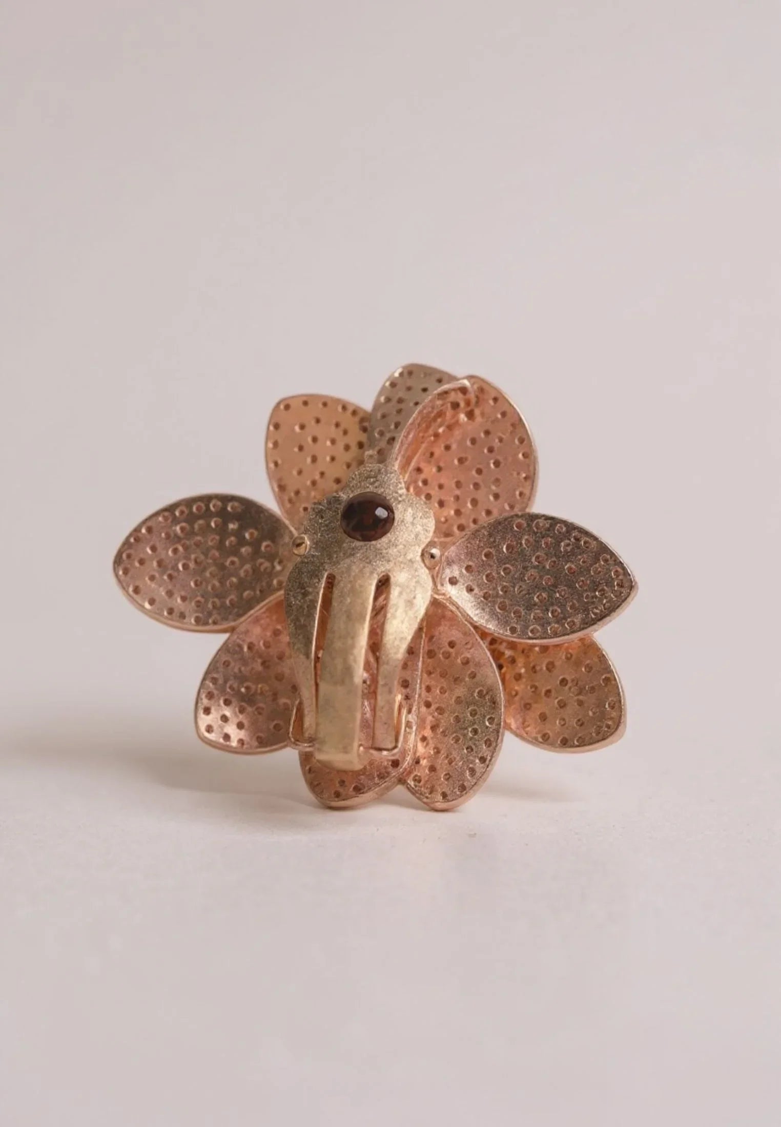 Clip-on backing of the earring.