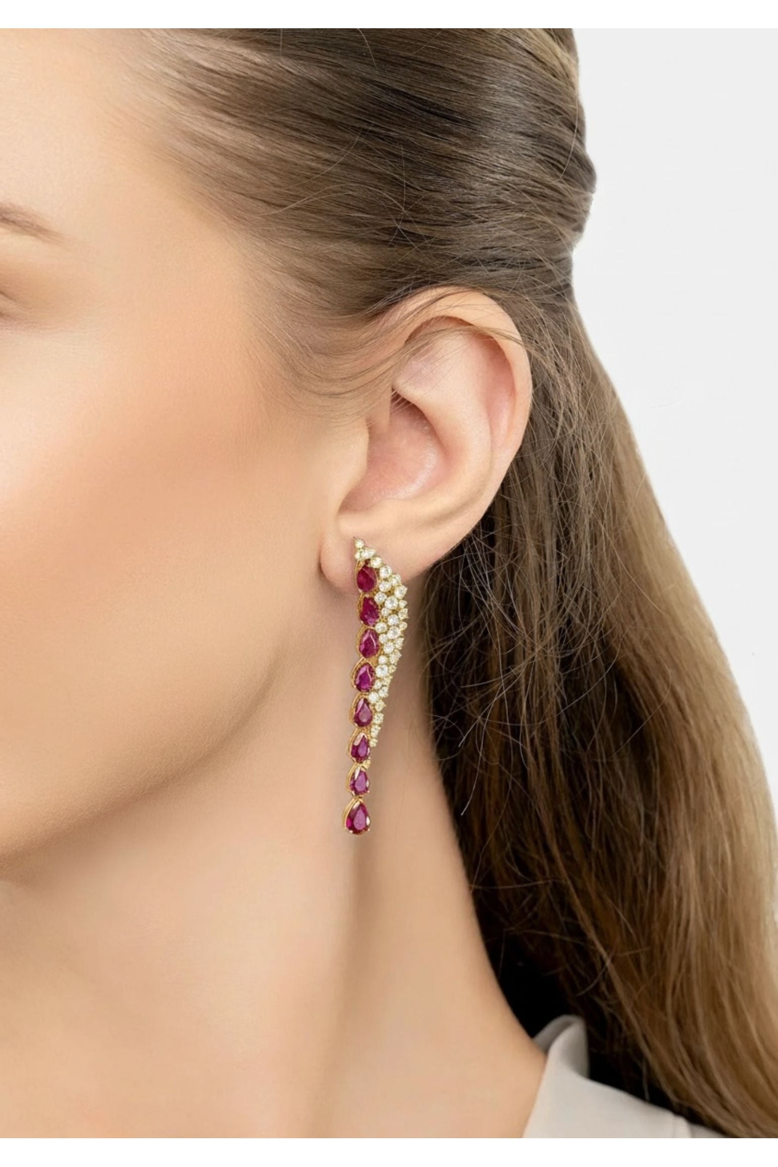 The earring worn by a model.