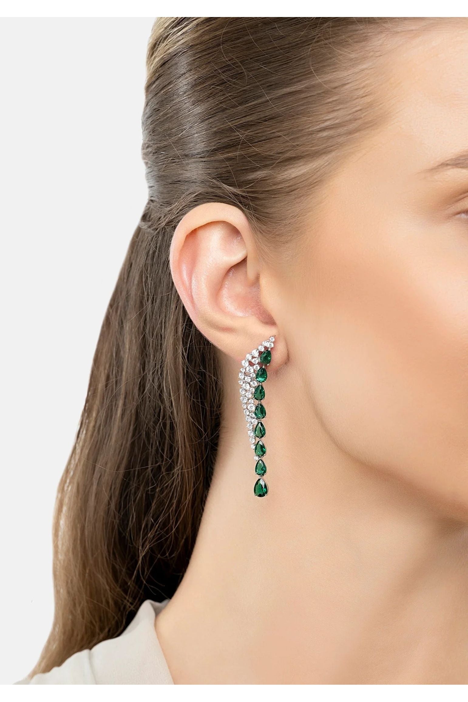 The earring worn by a model.