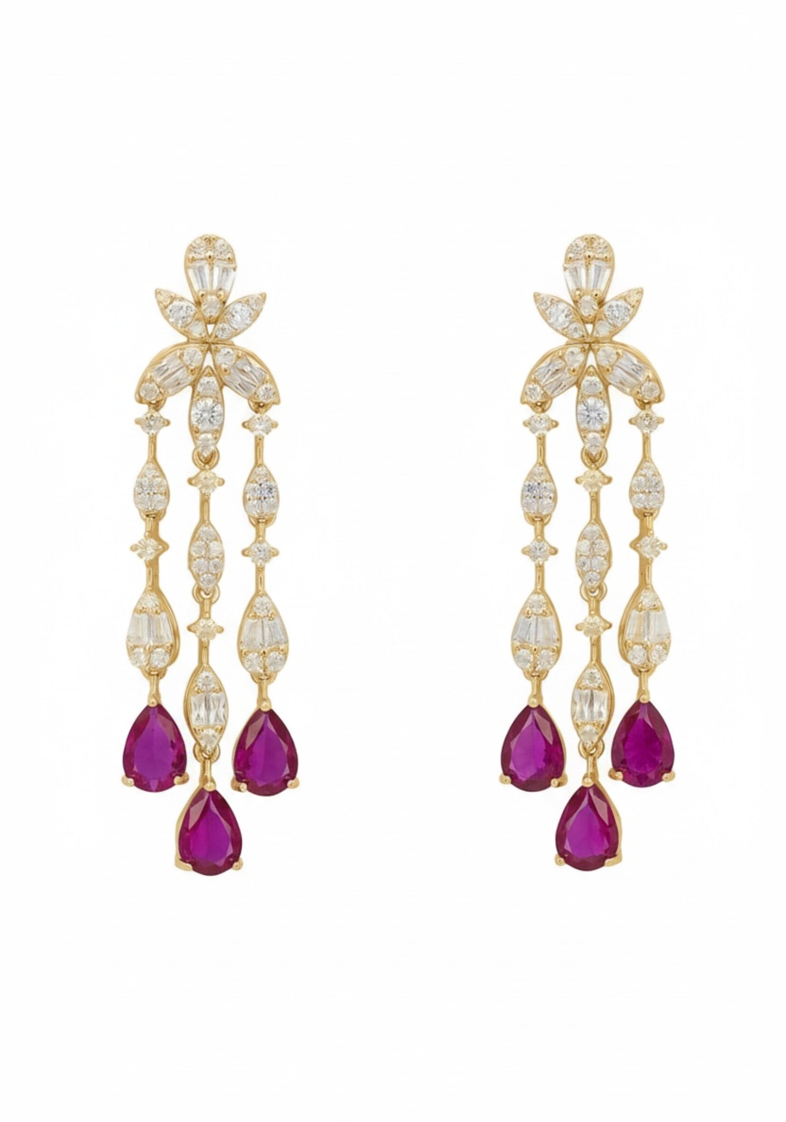 Ruby teardrops, diamond and gold drop earrings.