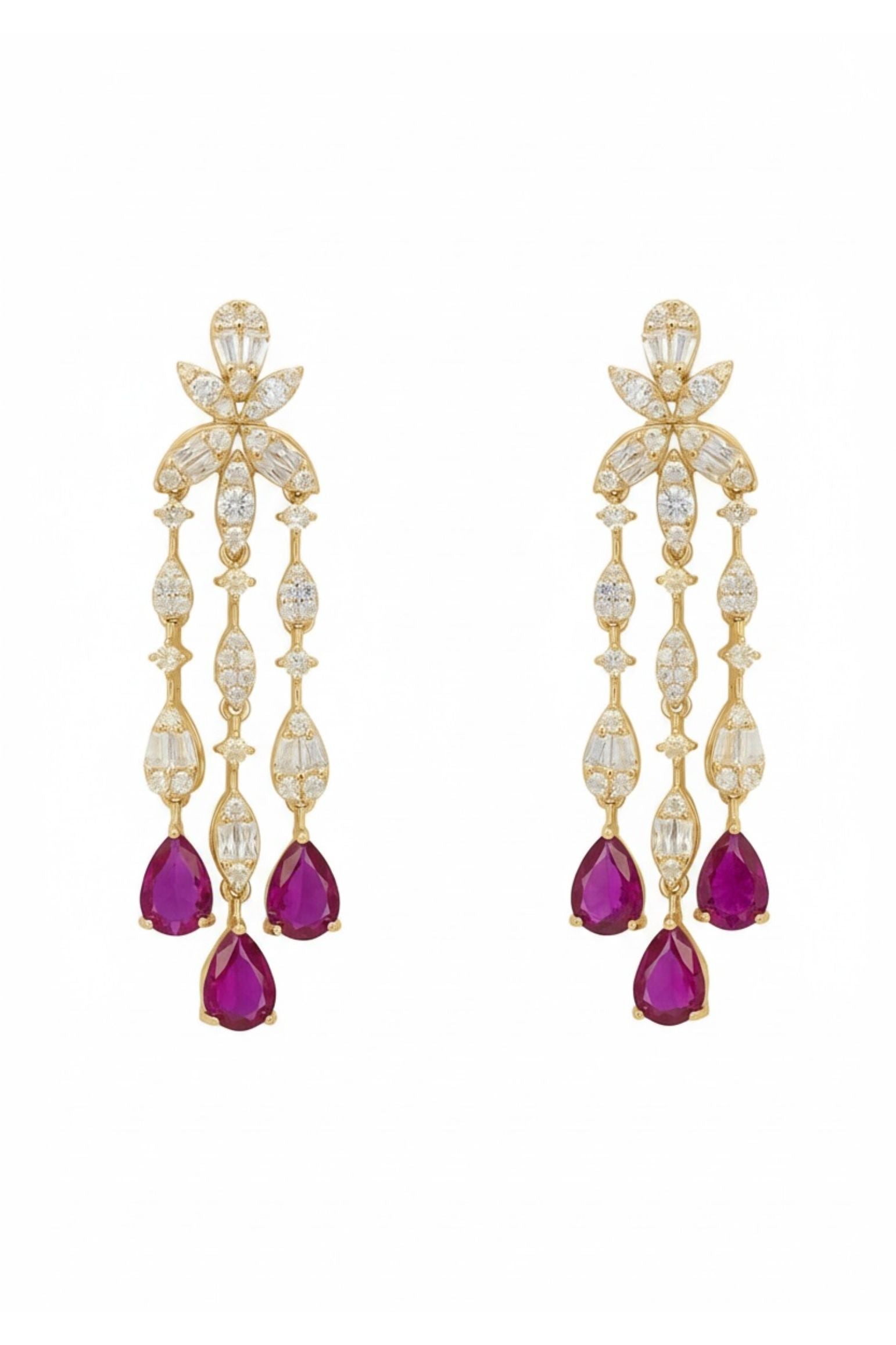 Ruby teardrops, diamond and gold drop earrings.