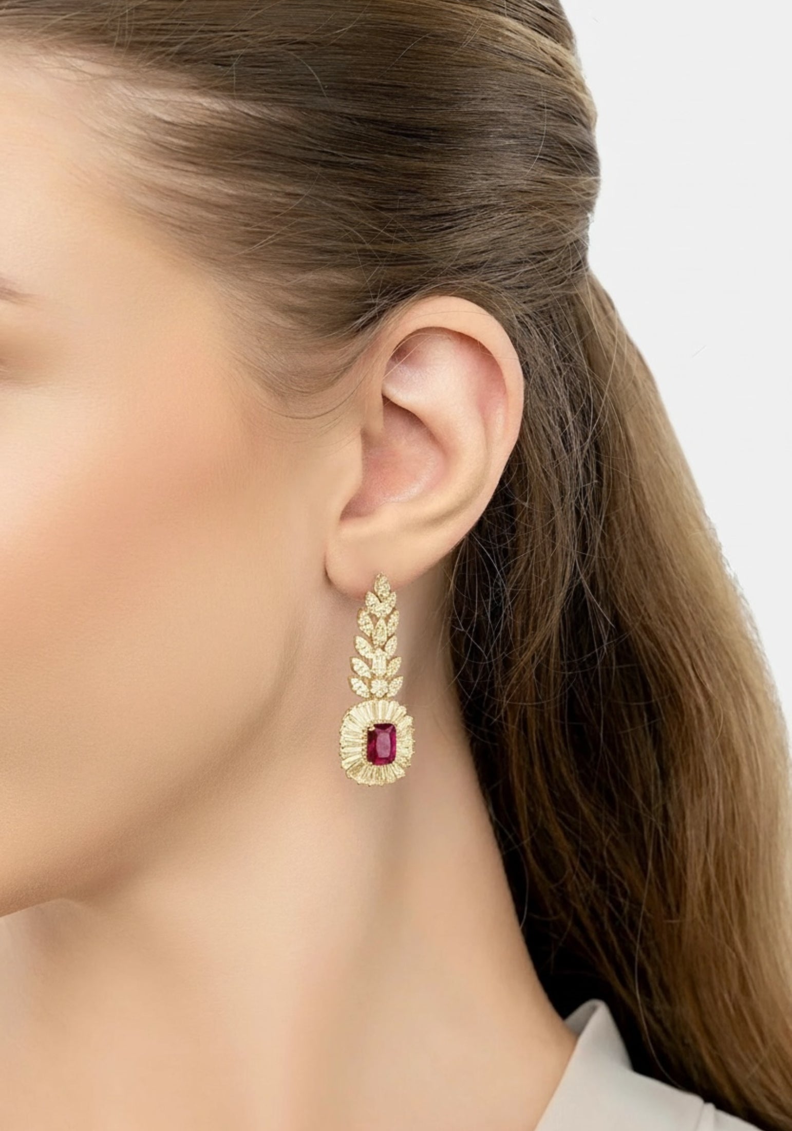 The earring worn by a model.