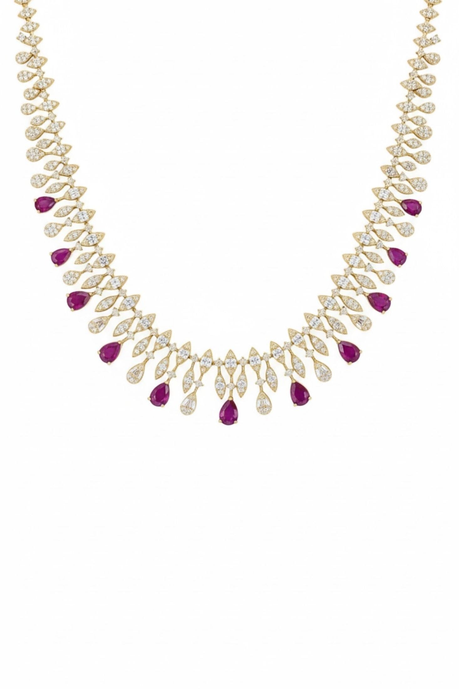 Close-up of the ruby teardrops, diamond and gold necklace.