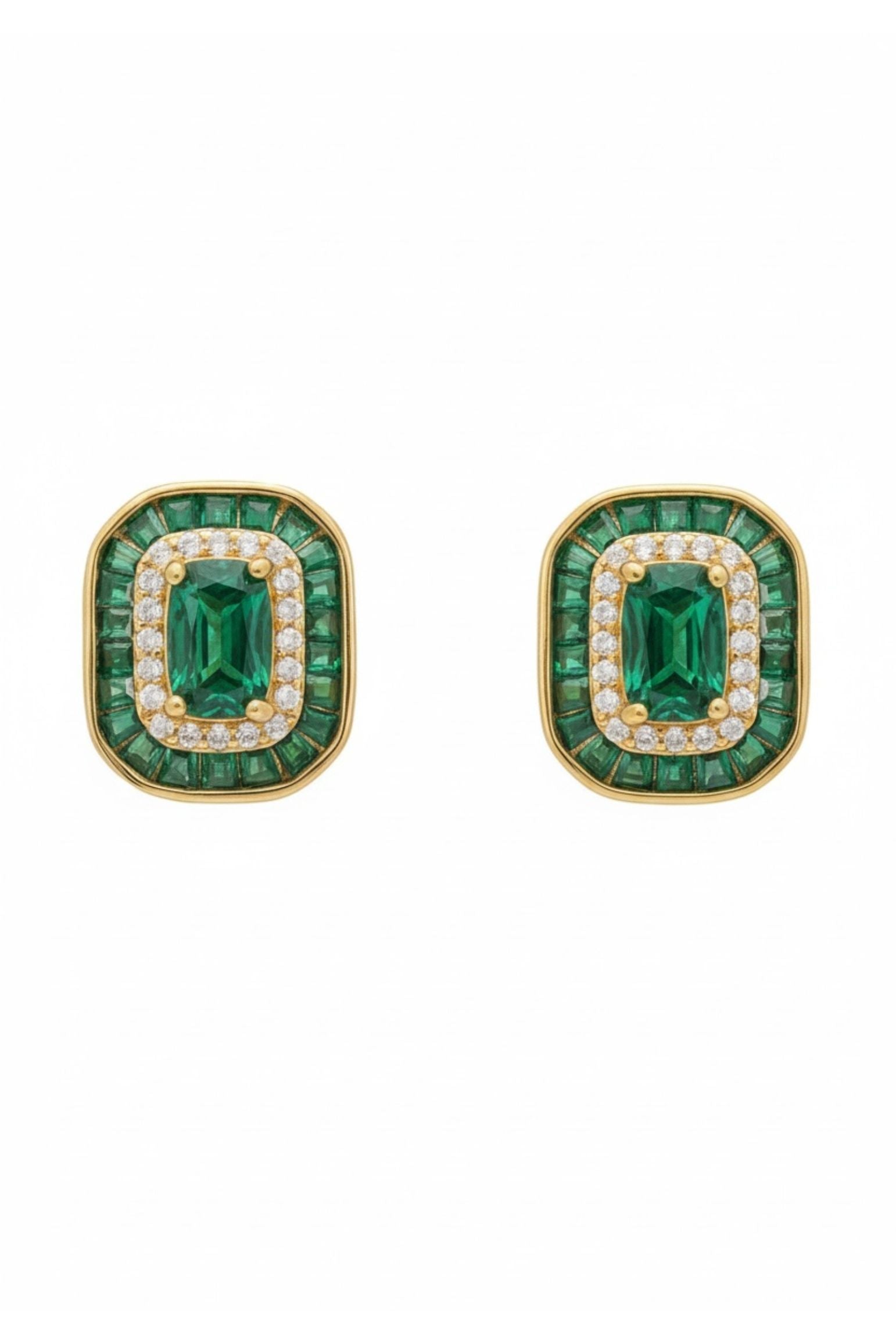 Diamond and emerald gold stud earrings.