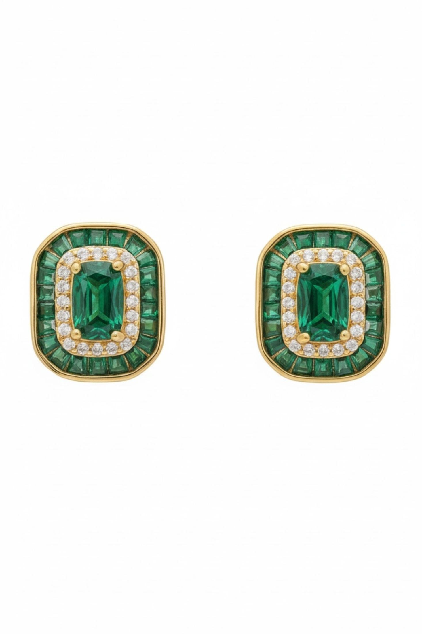 Diamond and emerald gold stud earrings.
