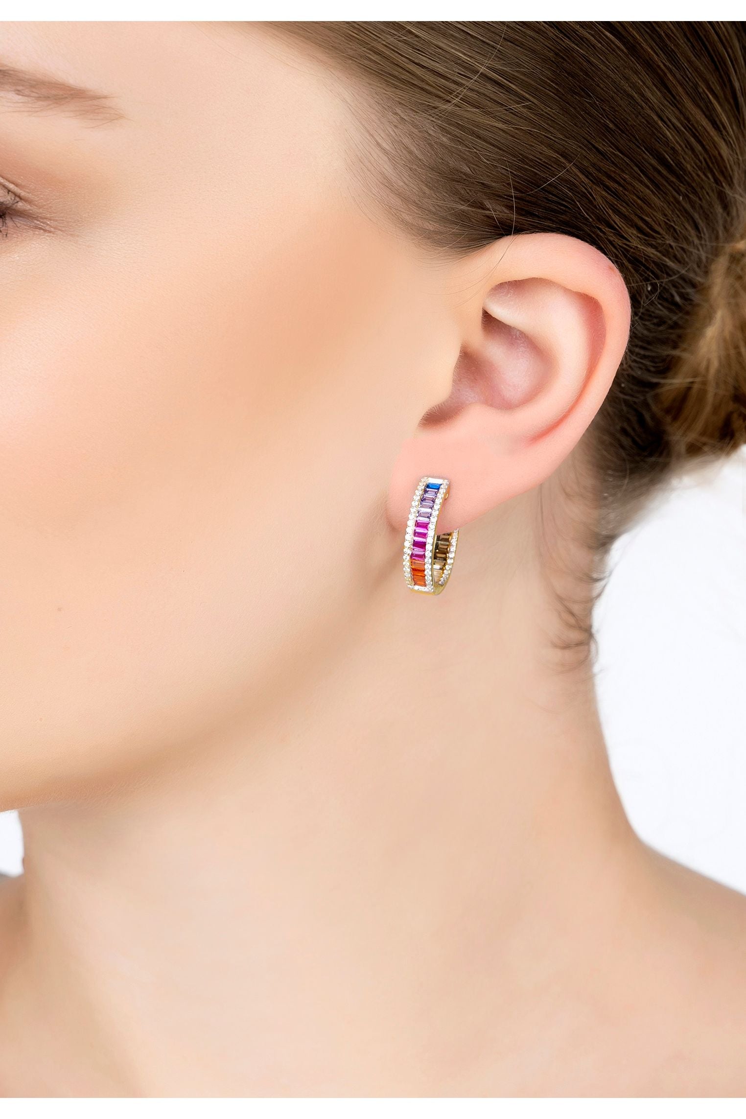 The earring worn by a model.