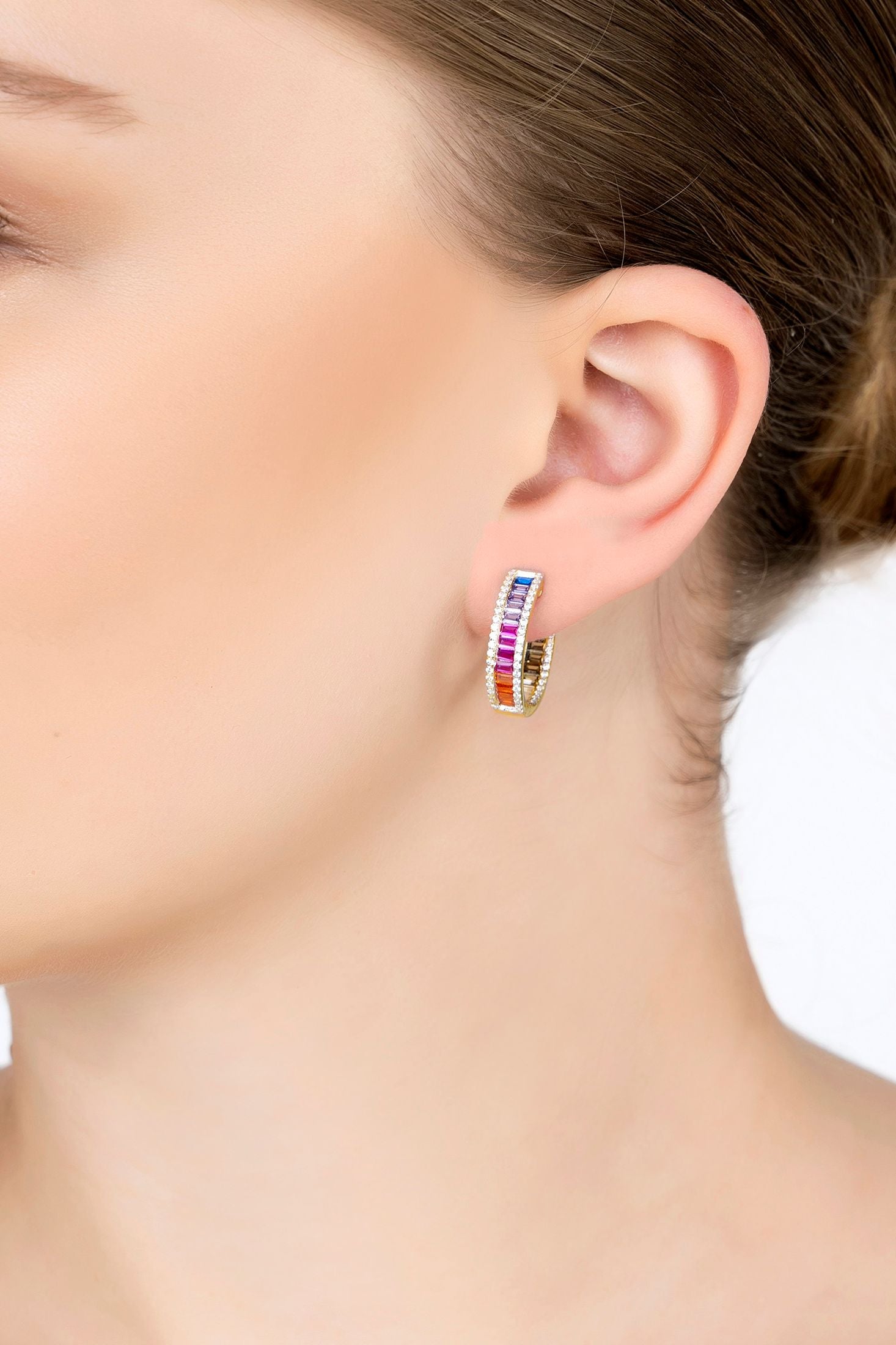 The earring worn by a model.