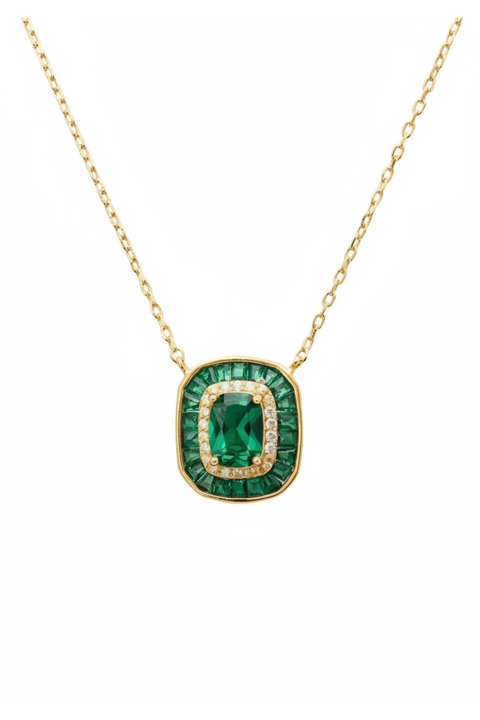 Diamond and emerald charm gold necklace.