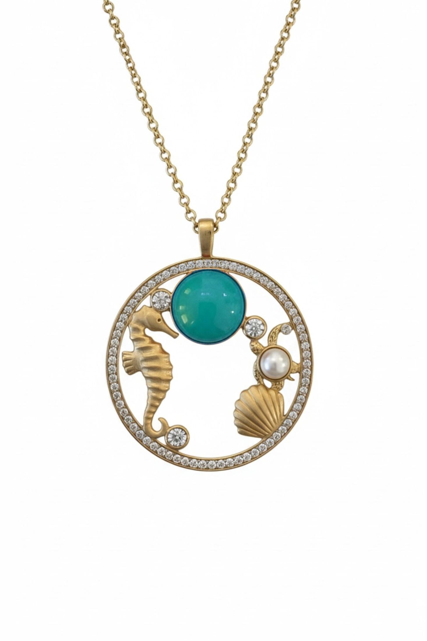 18k gold plated oceanic pendant necklace with a turquoise stone and cubic zirconia.